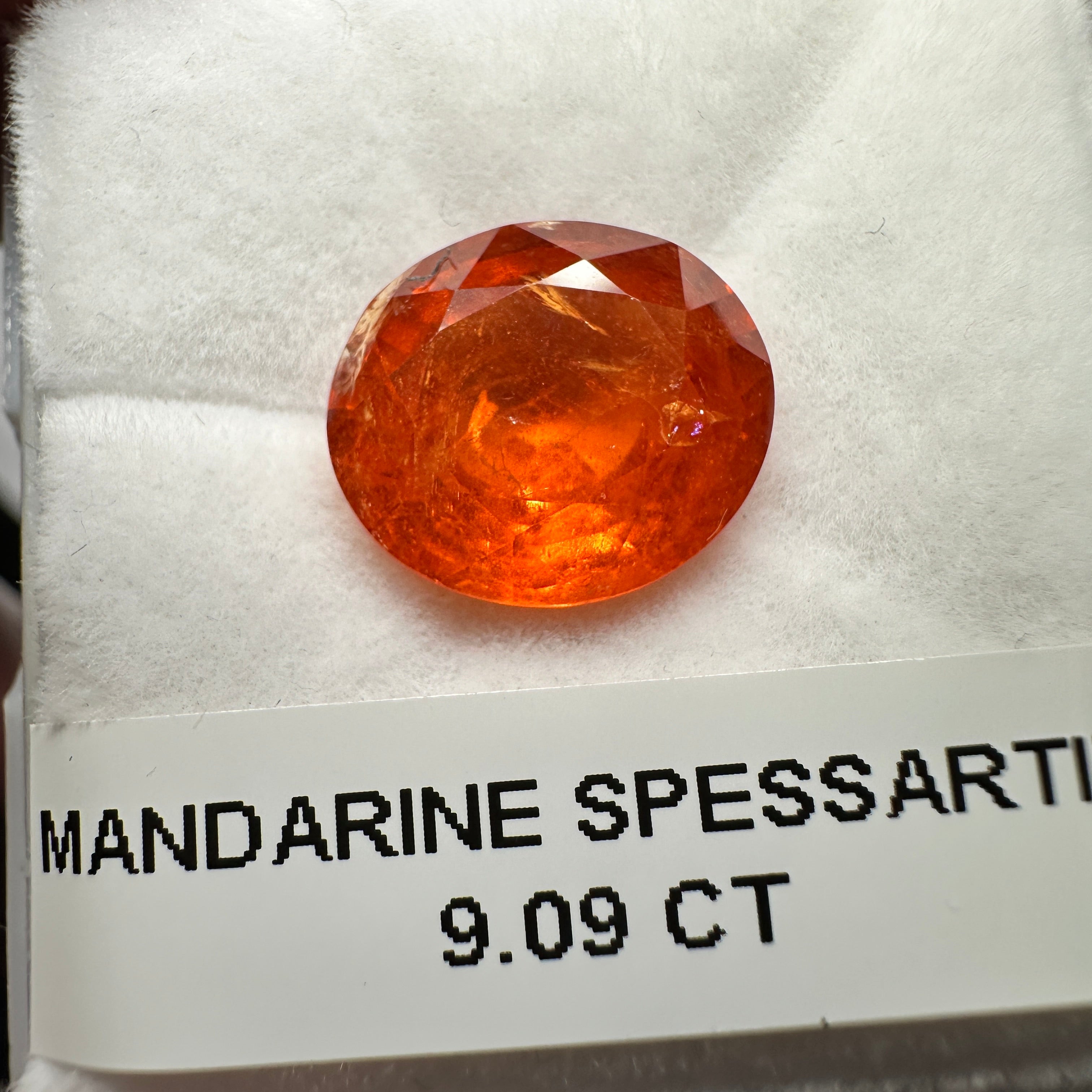 9.09ct Mandarin Spessartite Garnet, Untreated Unheated. 12.8 x 11.2 x 6.8mm, stone has some veils, slight sugar and inclusions