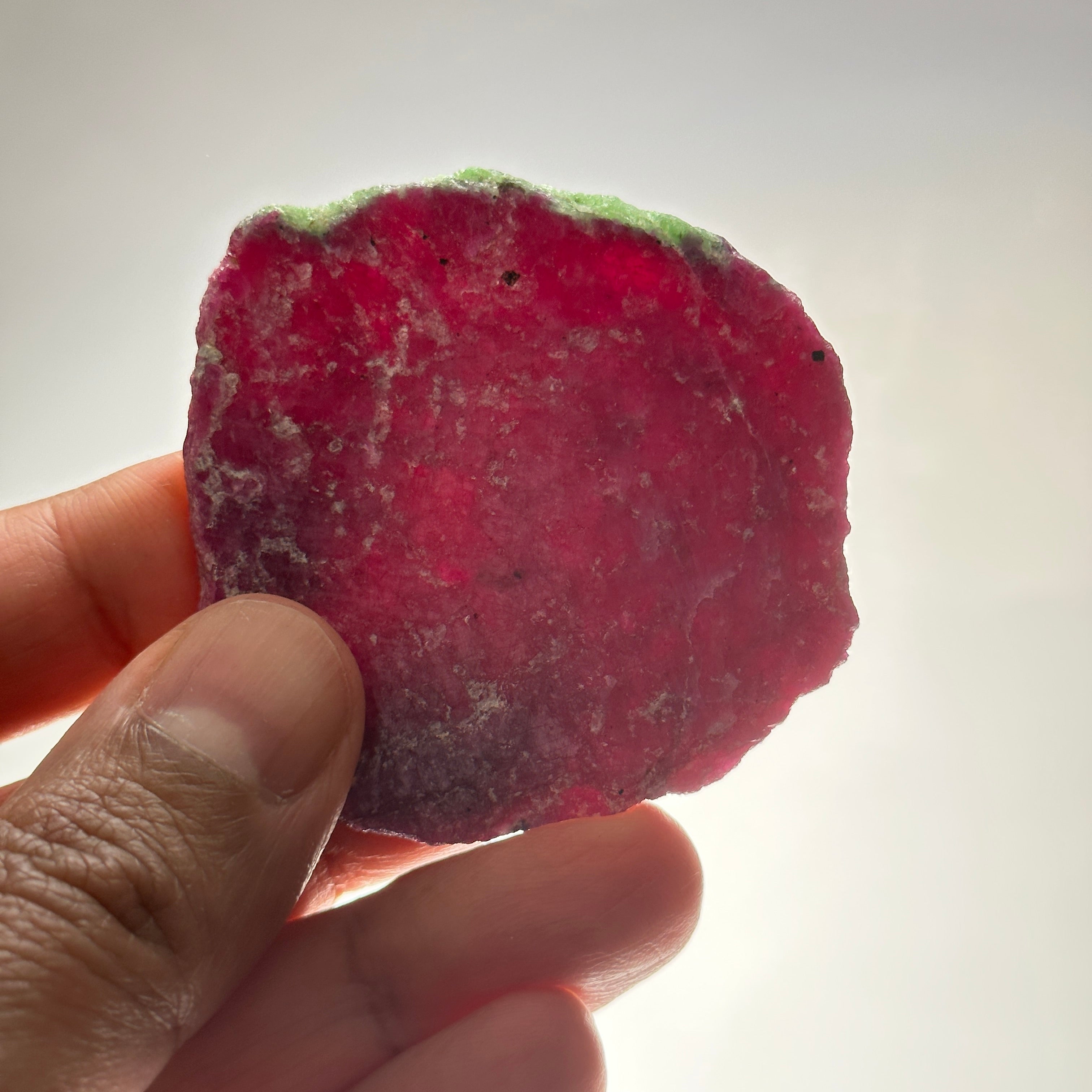 25.90gm Ruby Natural Flat, this crystal disk has been naturally formed flat and not sliced, Longido, Tanzania, Untreated Unheated. 53.50 x 58.00 x 3.30mm, we have never seen it naturally flat crystalized