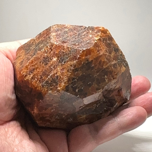 797gm (3985ct) Mandarin Spessartite Garnet Crystal, Loliondo, Tanzania. 87 x 67 x 64mm. Untreated Unheated