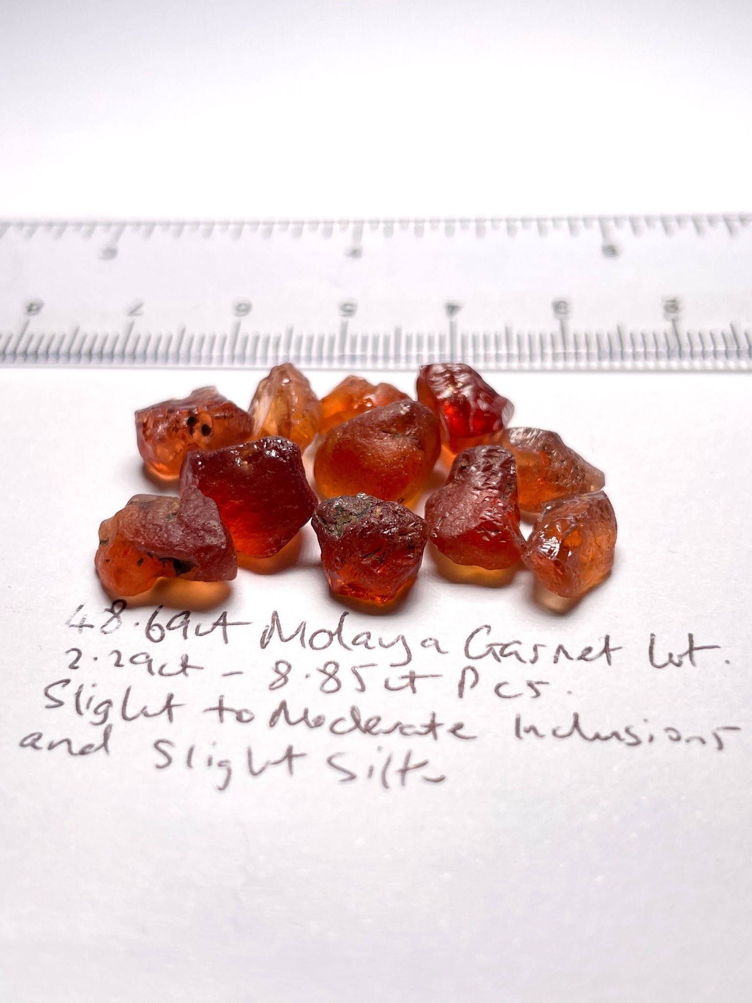 48.69Ct Malaya Garnet Lot All Have Slight To Moderate Inclusions And Silk Tanzania Untreated