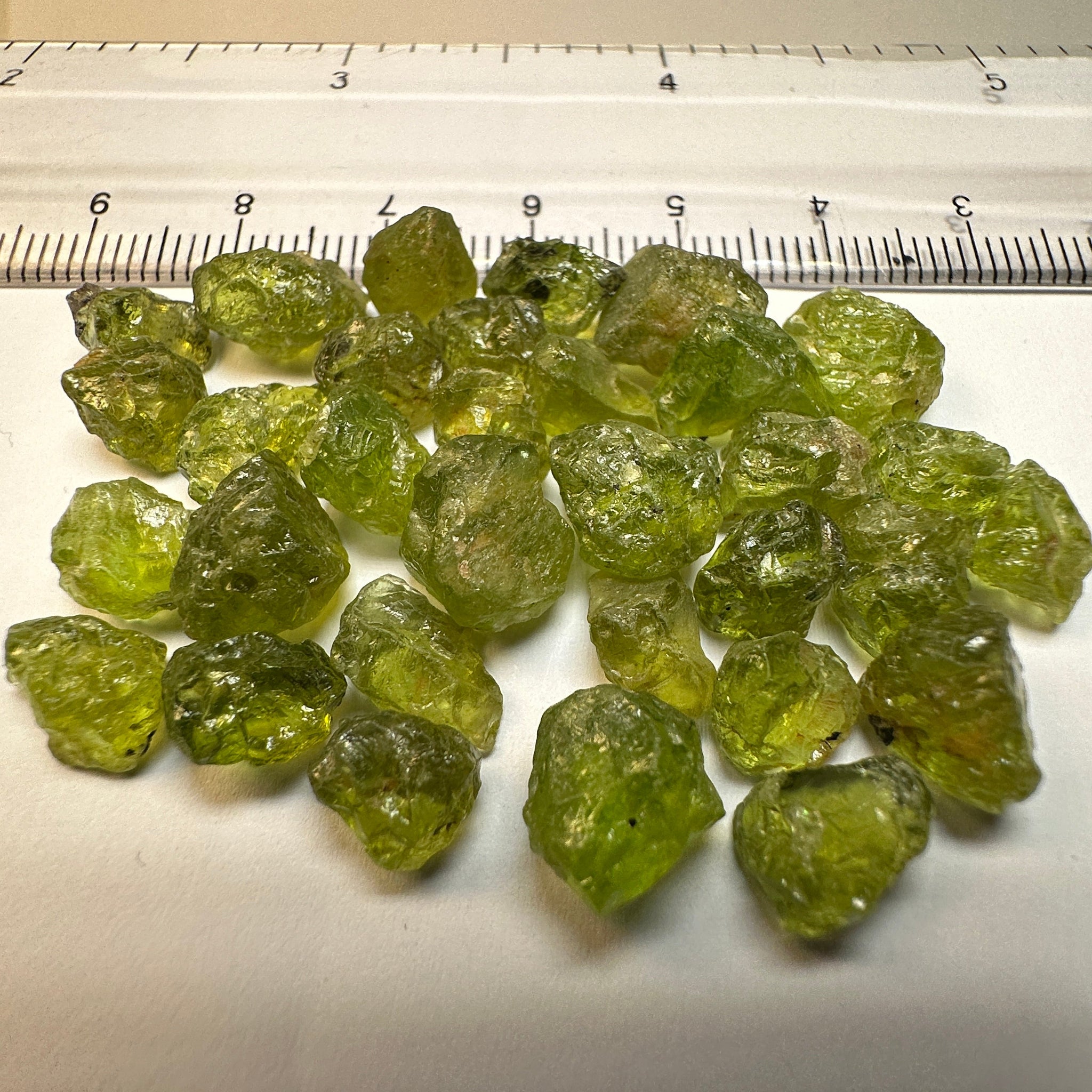 84.40Ct Ethiopian Peridot. 1.58Ct To 4.78. Slight Moderate Inclusions