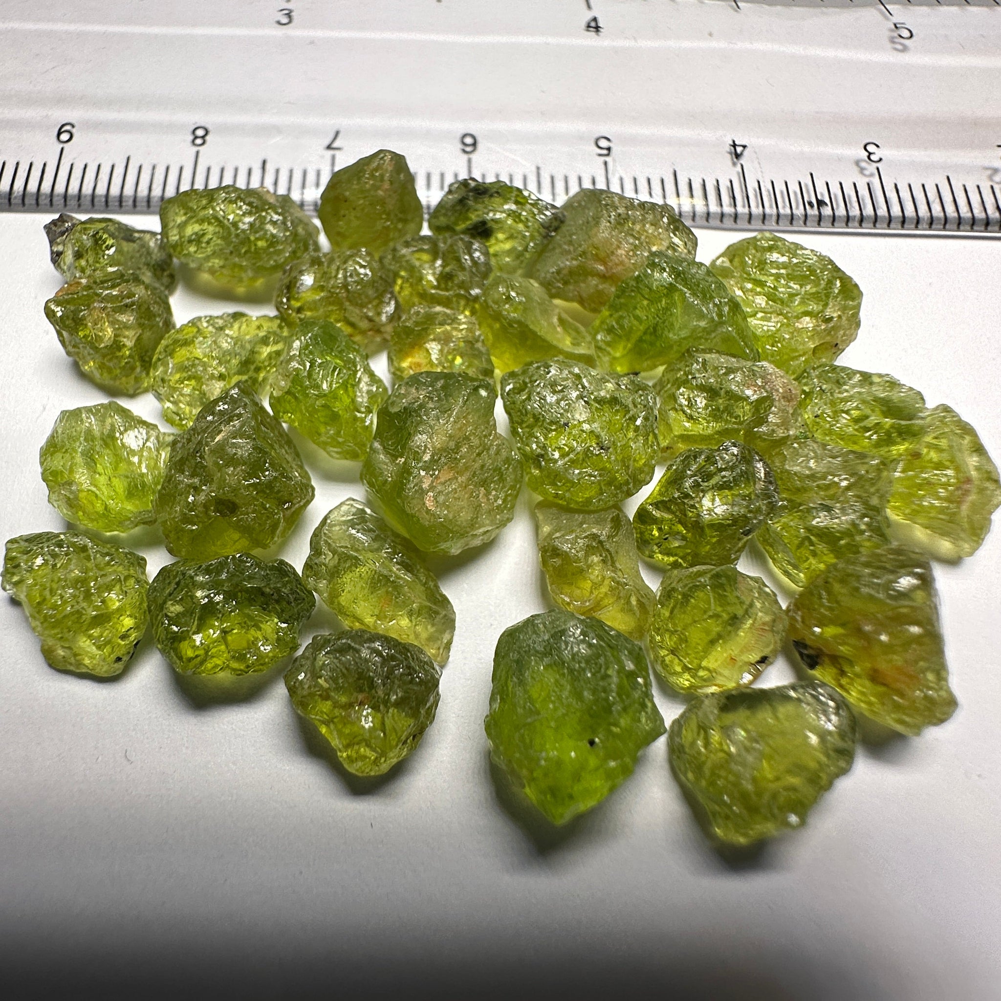 84.40Ct Ethiopian Peridot. 1.58Ct To 4.78. Slight Moderate Inclusions
