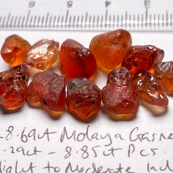 48.69Ct Malaya Garnet Lot All Have Slight To Moderate Inclusions And Silk Tanzania Untreated