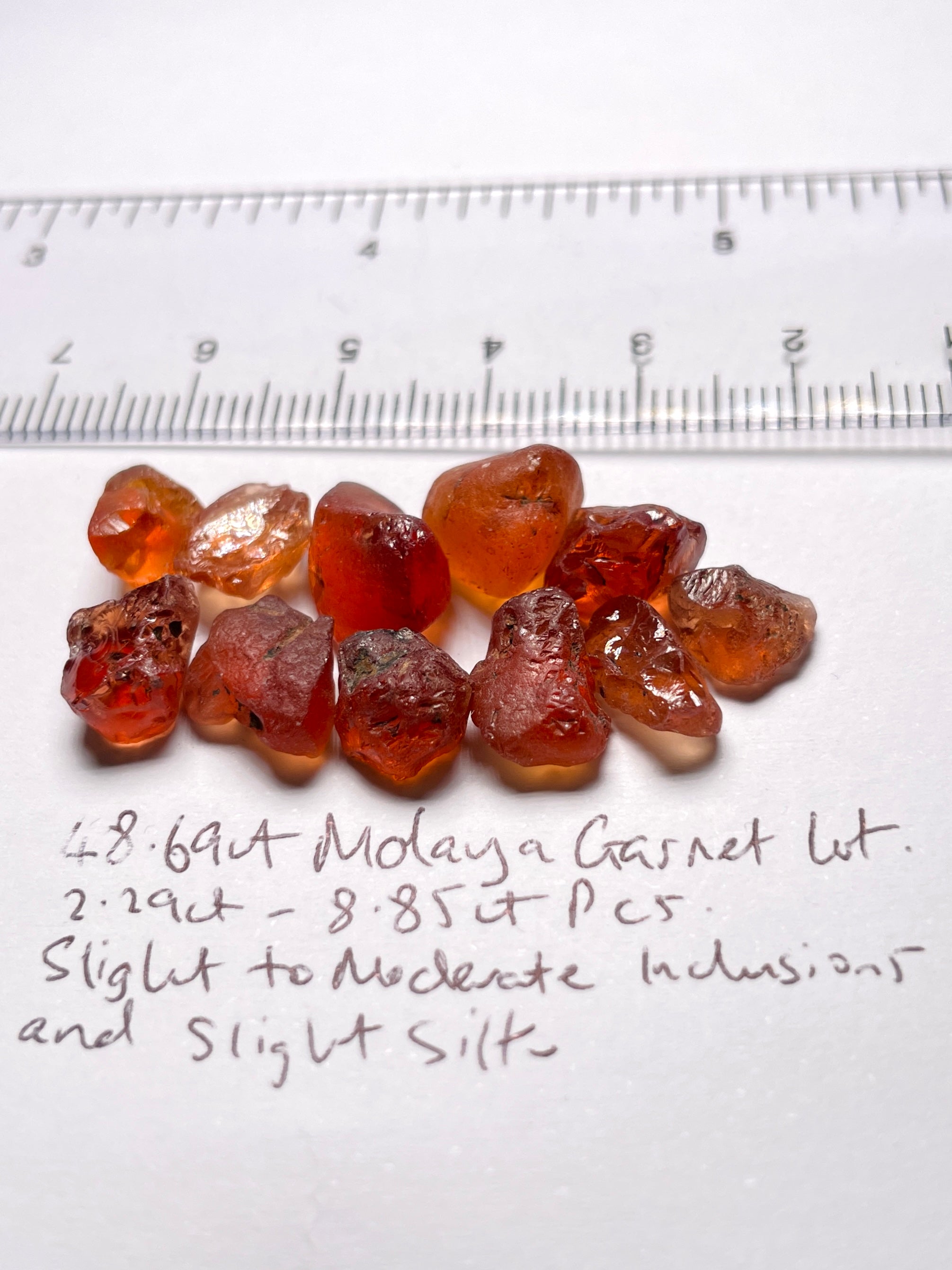 48.69Ct Malaya Garnet Lot All Have Slight To Moderate Inclusions And Silk Tanzania Untreated