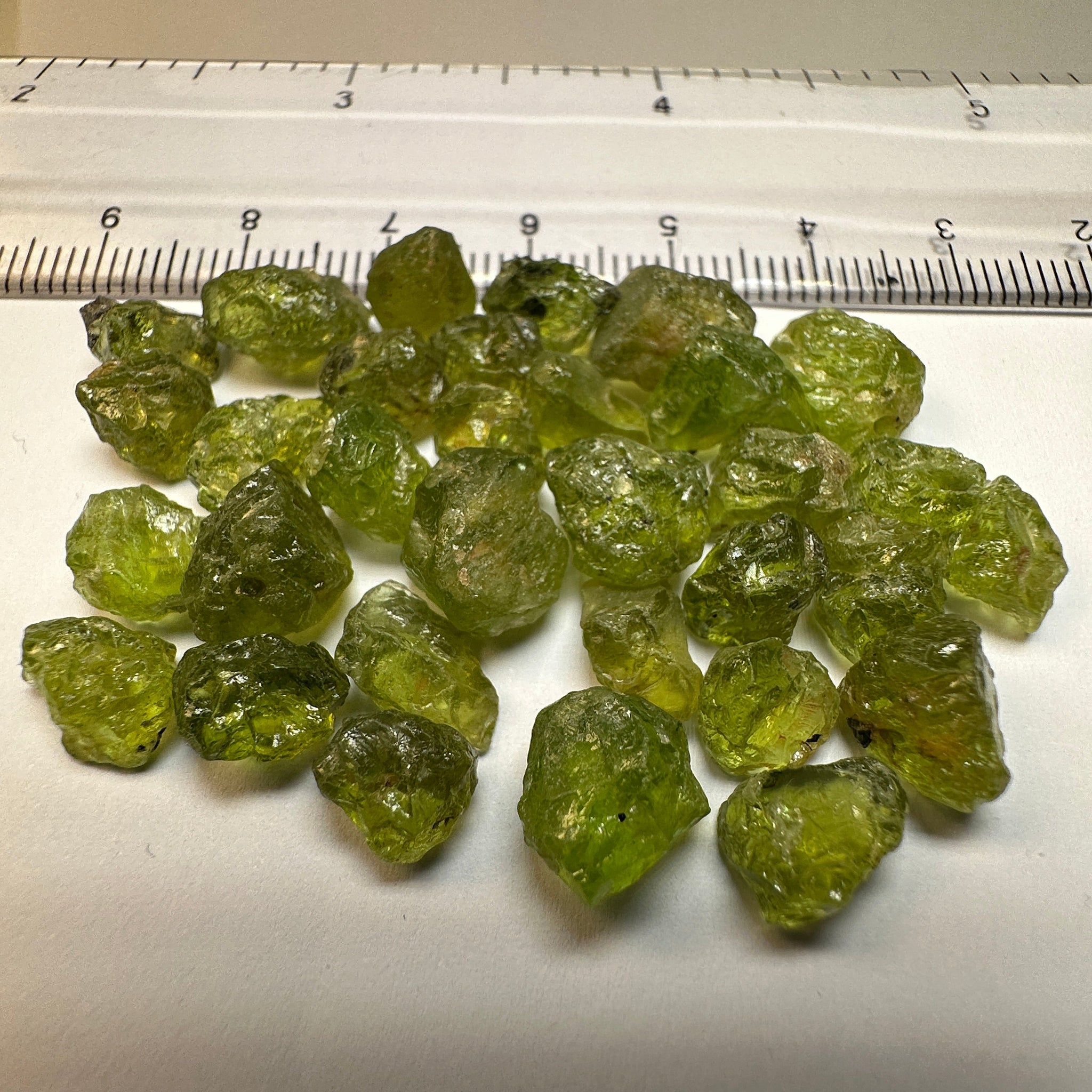 84.40Ct Ethiopian Peridot. 1.58Ct To 4.78. Slight Moderate Inclusions