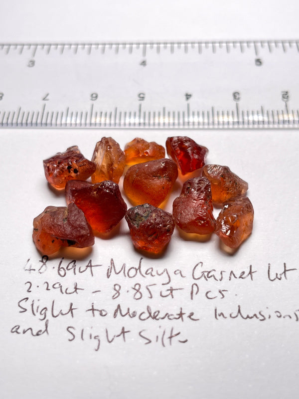 48.69Ct Malaya Garnet Lot All Have Slight To Moderate Inclusions And Silk Tanzania Untreated
