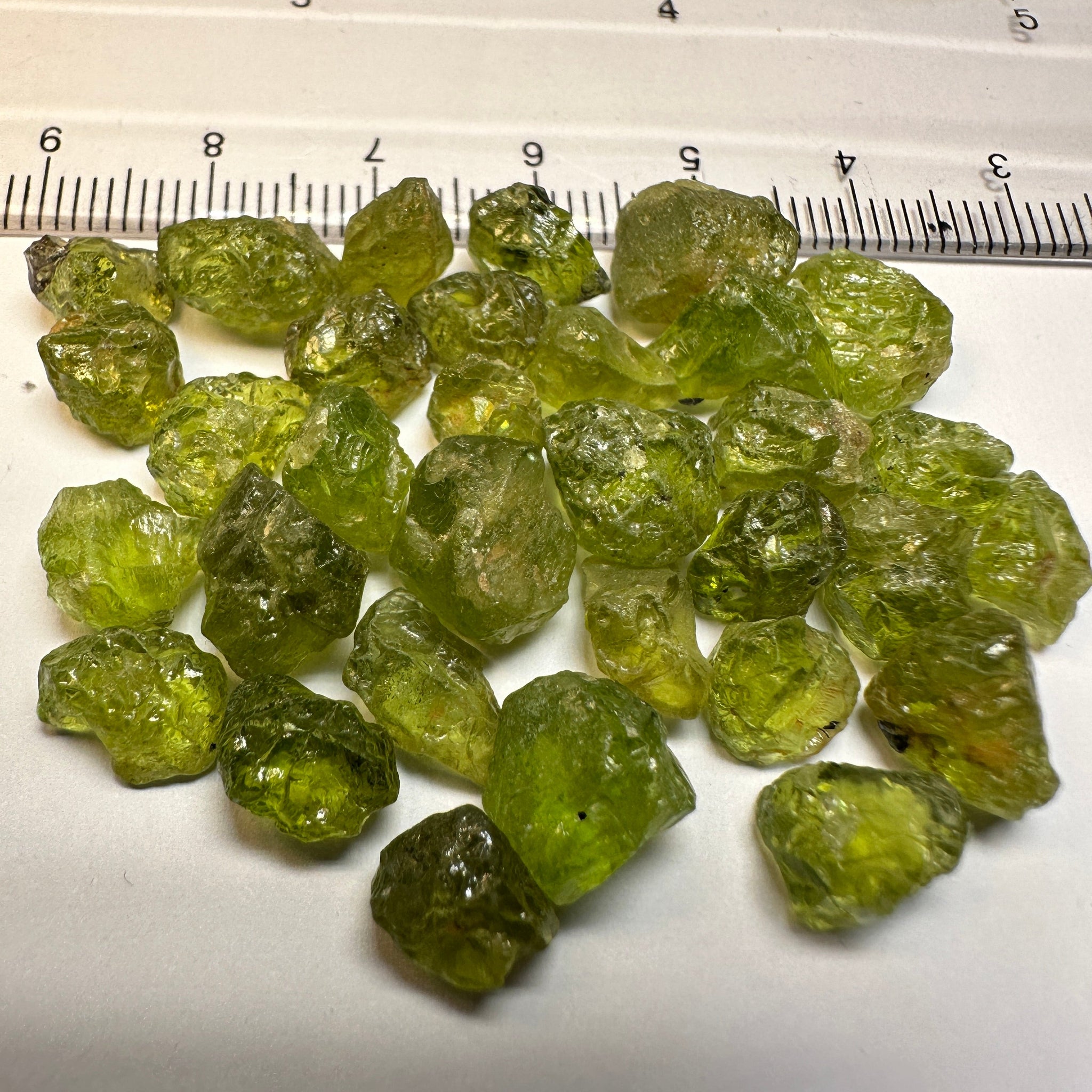 84.40Ct Ethiopian Peridot. 1.58Ct To 4.78. Slight Moderate Inclusions