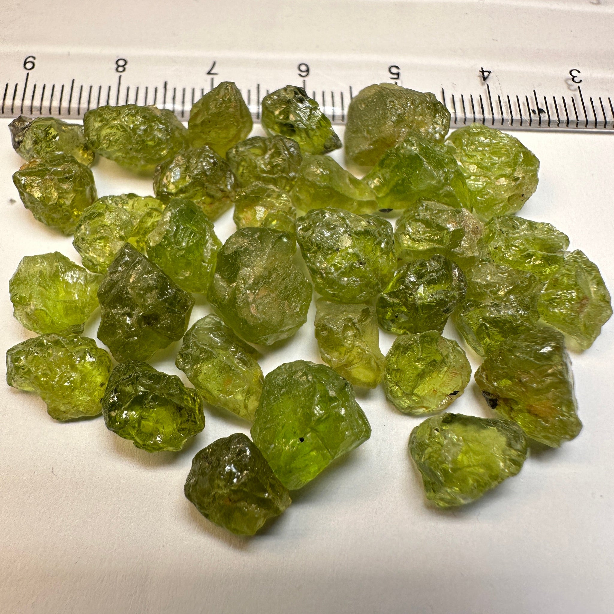 84.40Ct Ethiopian Peridot. 1.58Ct To 4.78. Slight Moderate Inclusions