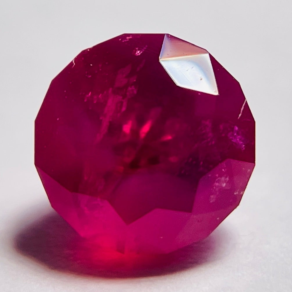 Winza Ruby, Tanzania, 1.475ct, Untreated Unheated. 5.7mm x 6.1mm, Custom Cut by us here in London, has a long pavilion for a high setting