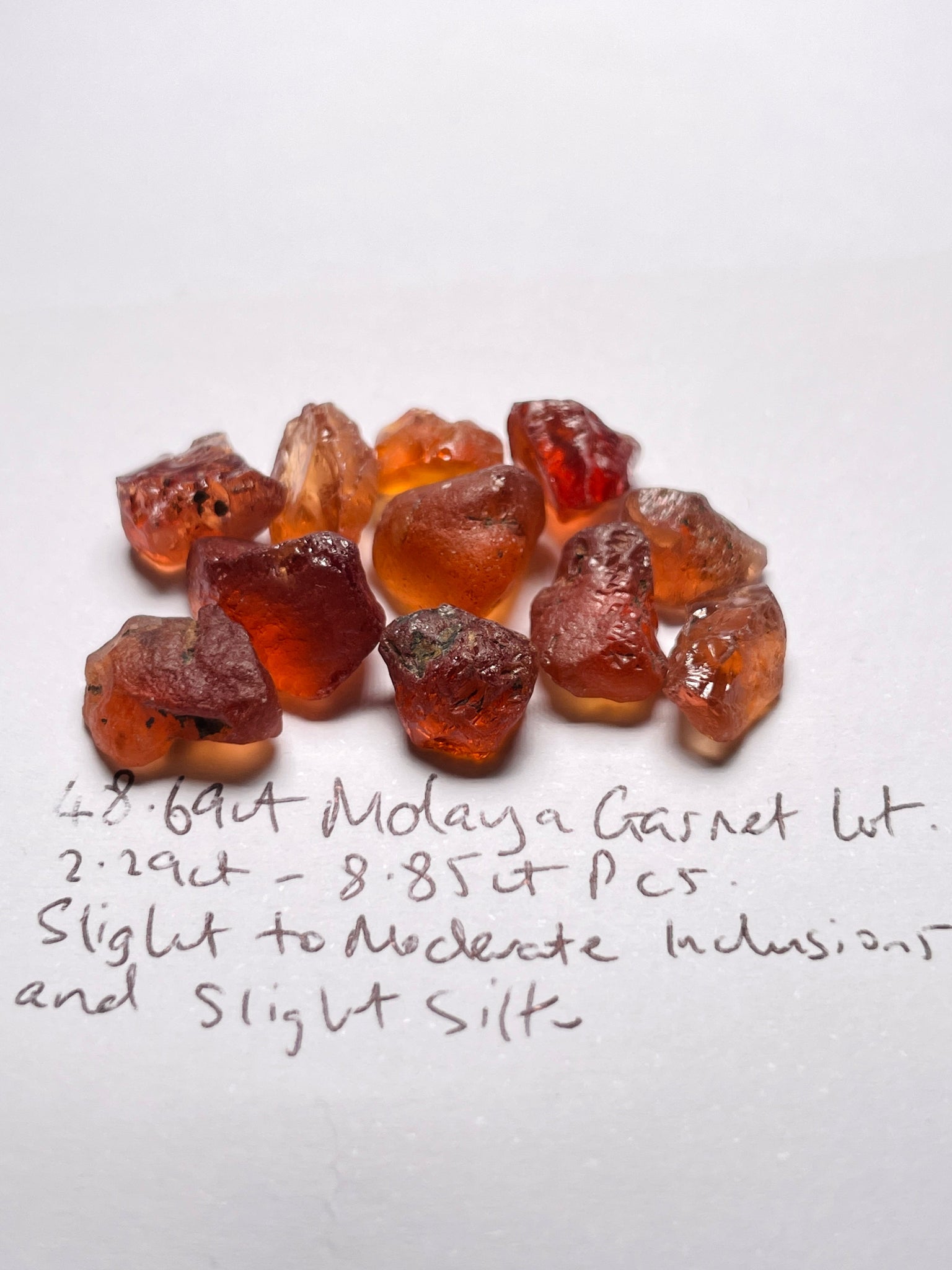 48.69Ct Malaya Garnet Lot All Have Slight To Moderate Inclusions And Silk Tanzania Untreated