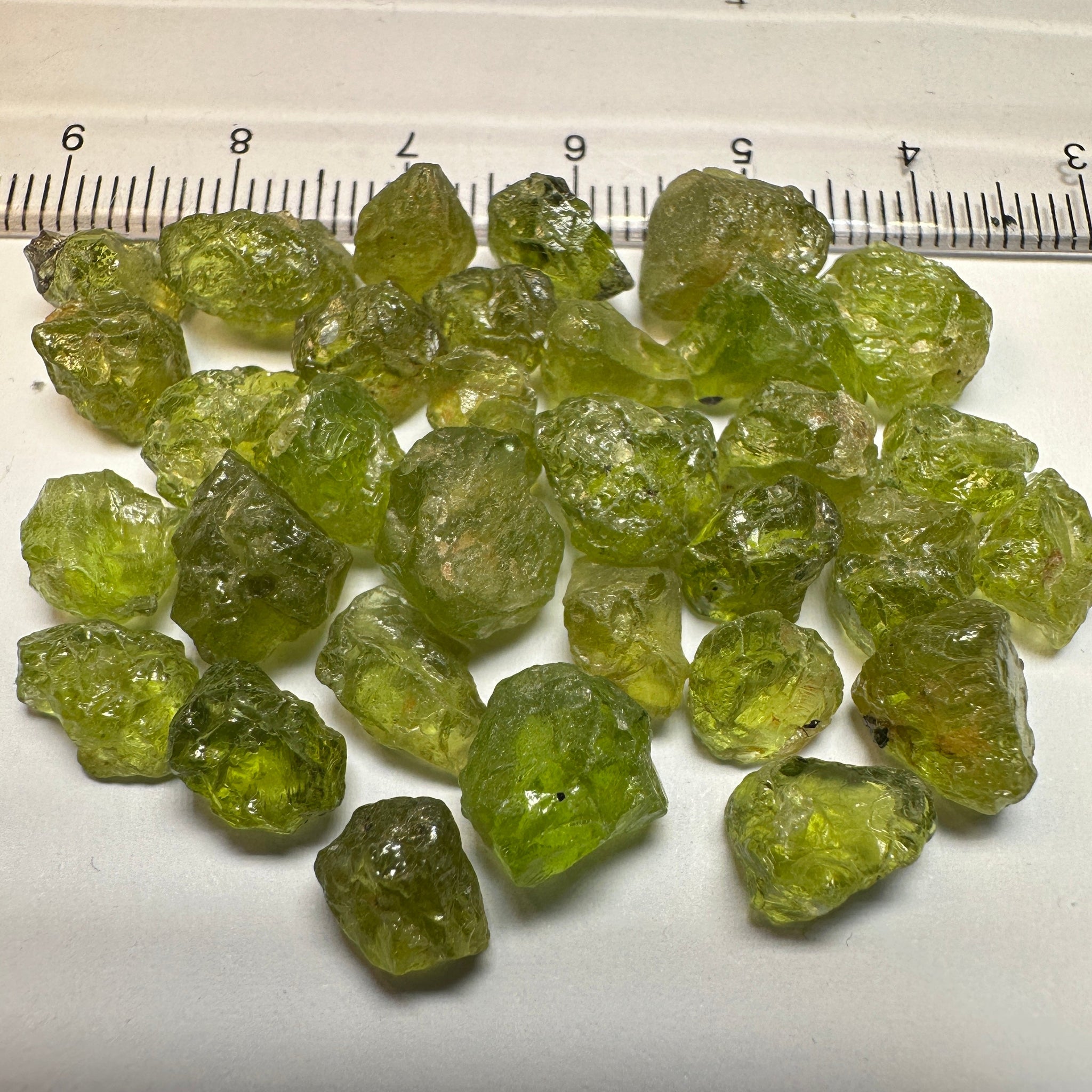 84.40Ct Ethiopian Peridot. 1.58Ct To 4.78. Slight Moderate Inclusions