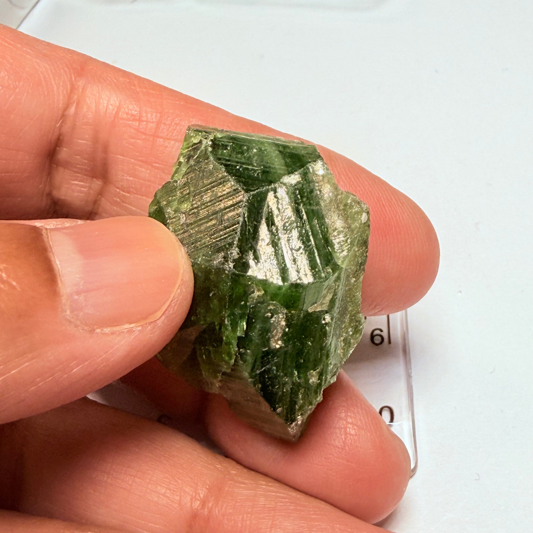 Tsavorite Crystal, 19.90gm / 99.50ct, Merelani. Tanzania, only the front is crystalized, but make a great specimen or set it in jewellery as is