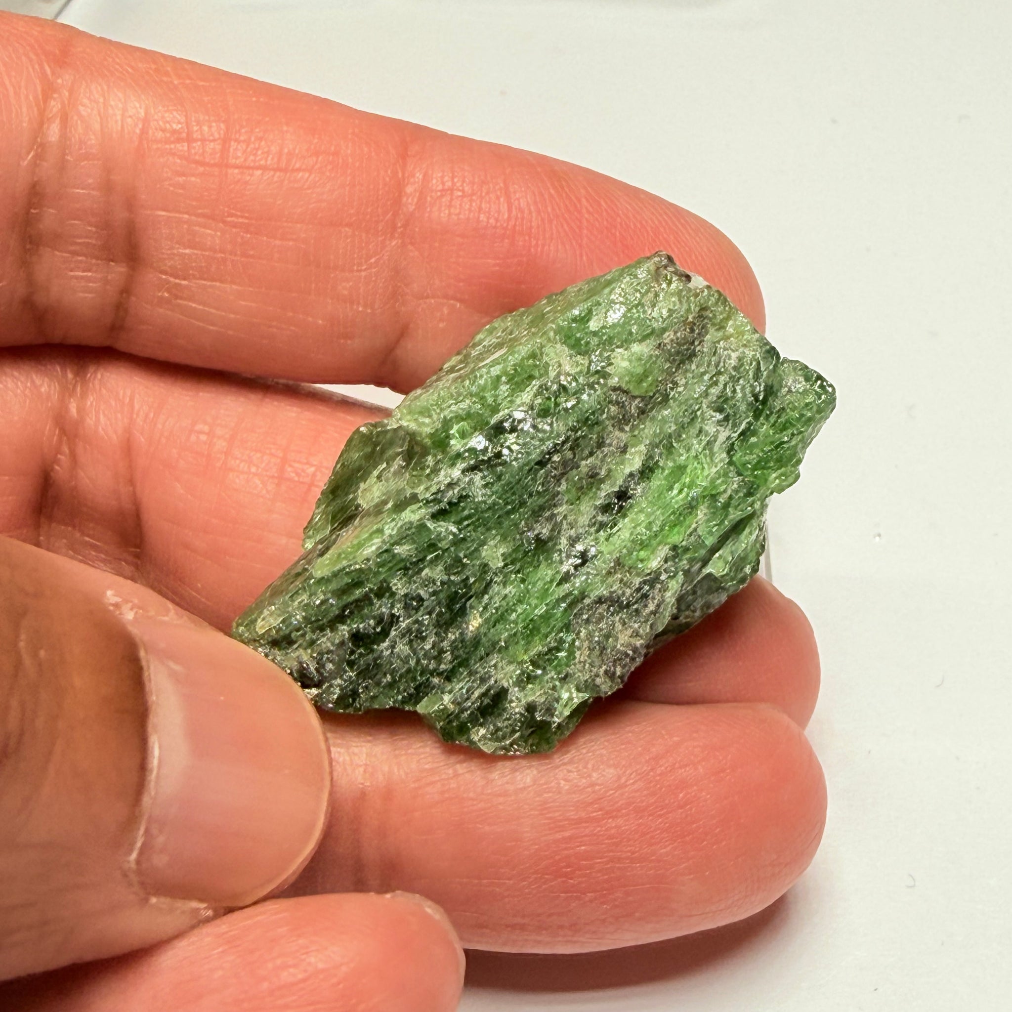 Tsavorite Crystal, 19.90gm / 99.50ct, Merelani. Tanzania, only the front is crystalized, but make a great specimen or set it in jewellery as is