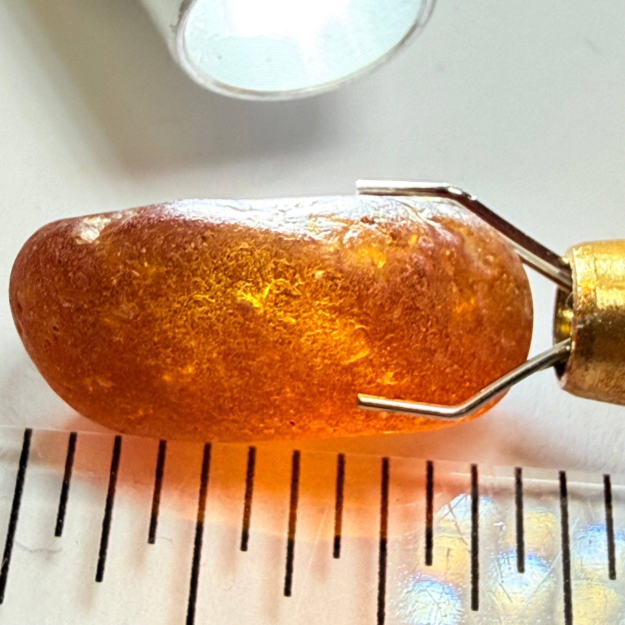Orange Garnet, 17.39ct, Tunduru, Tanzania, Untreated Unheated, has sugary type inclusions throughout the stone, Si, see backlit pics