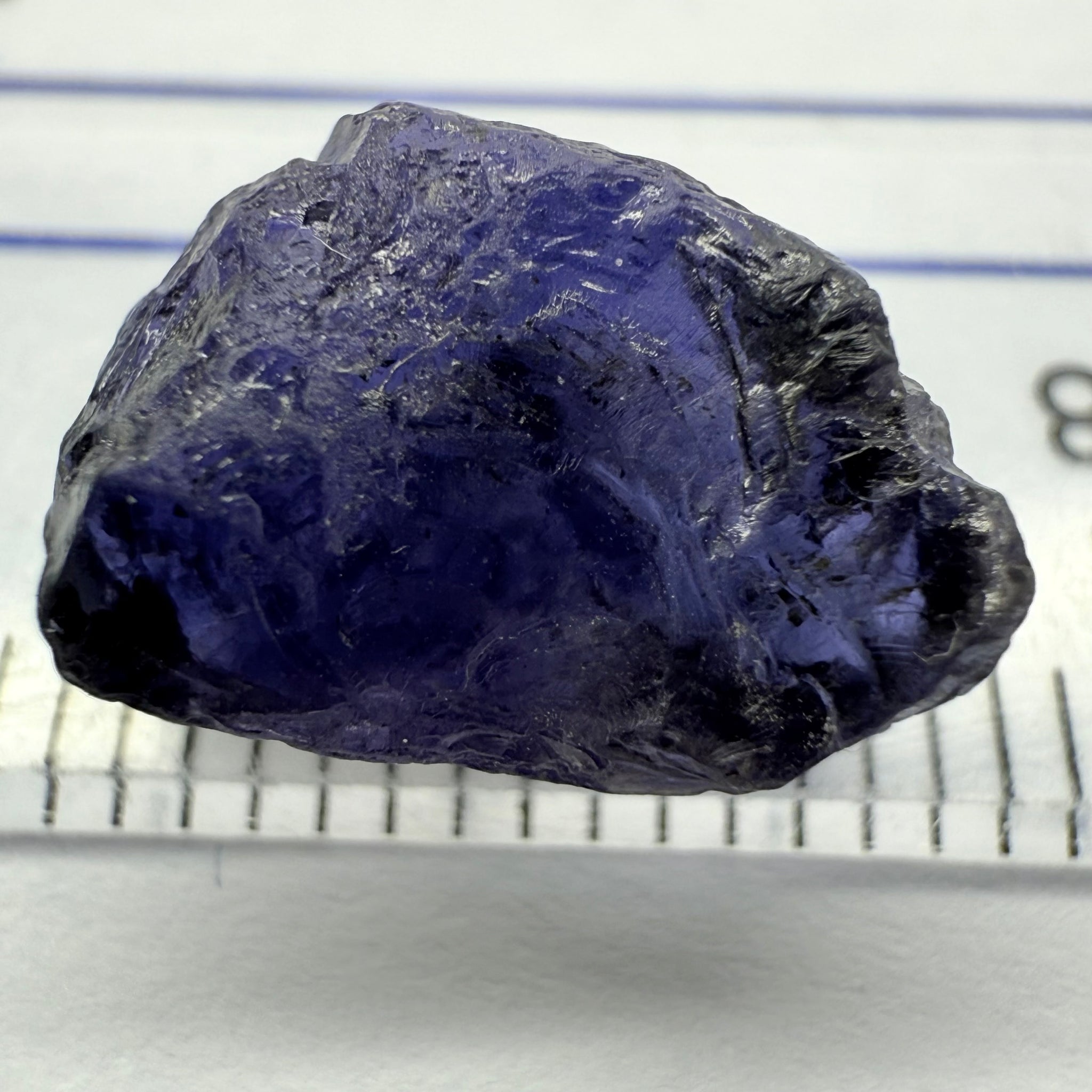 Iolite, 4.84ct, Tanzania, Untreated Unheated, slight inclusions and some white spots, has a flattish shape