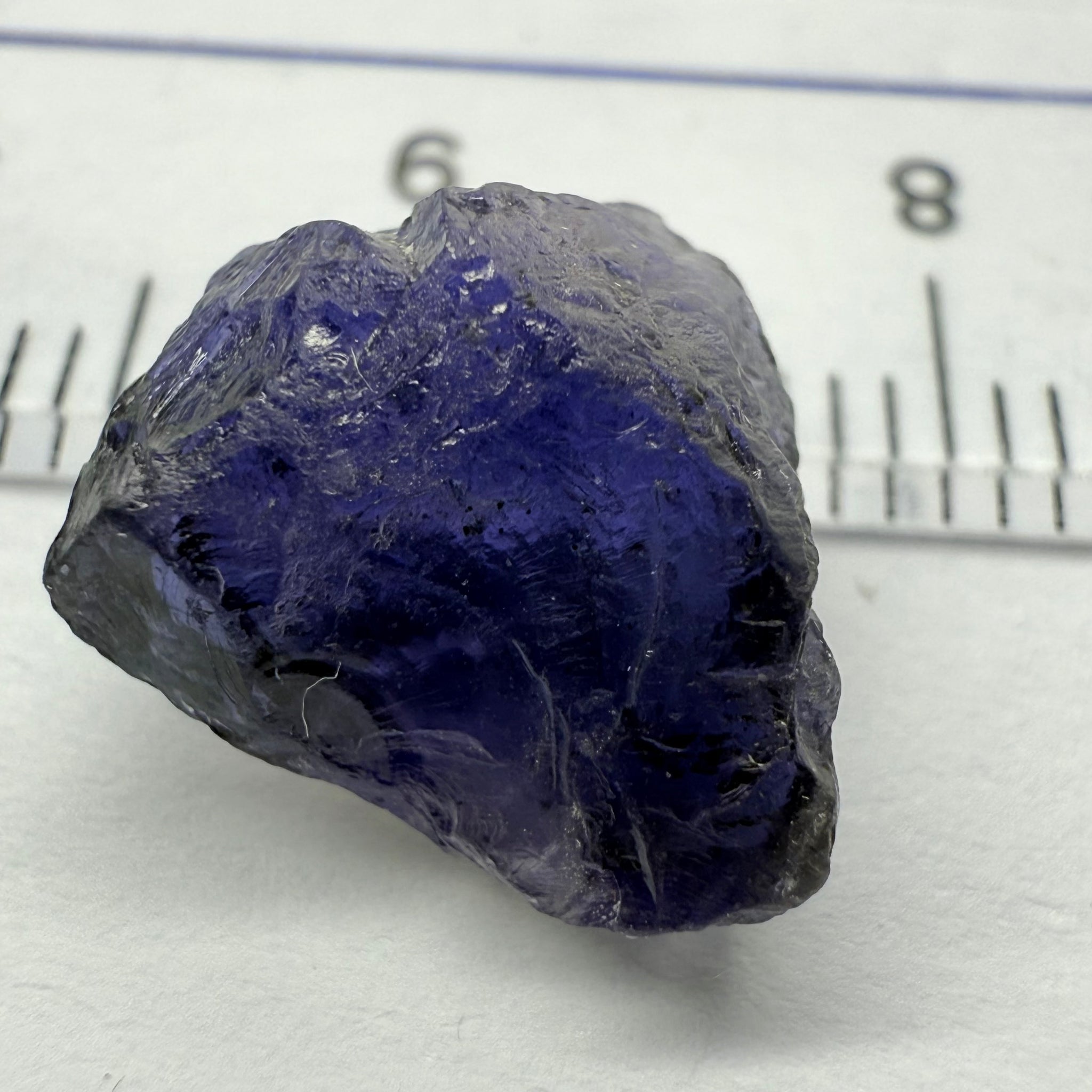 Iolite, 4.84ct, Tanzania, Untreated Unheated, slight inclusions and some white spots, has a flattish shape