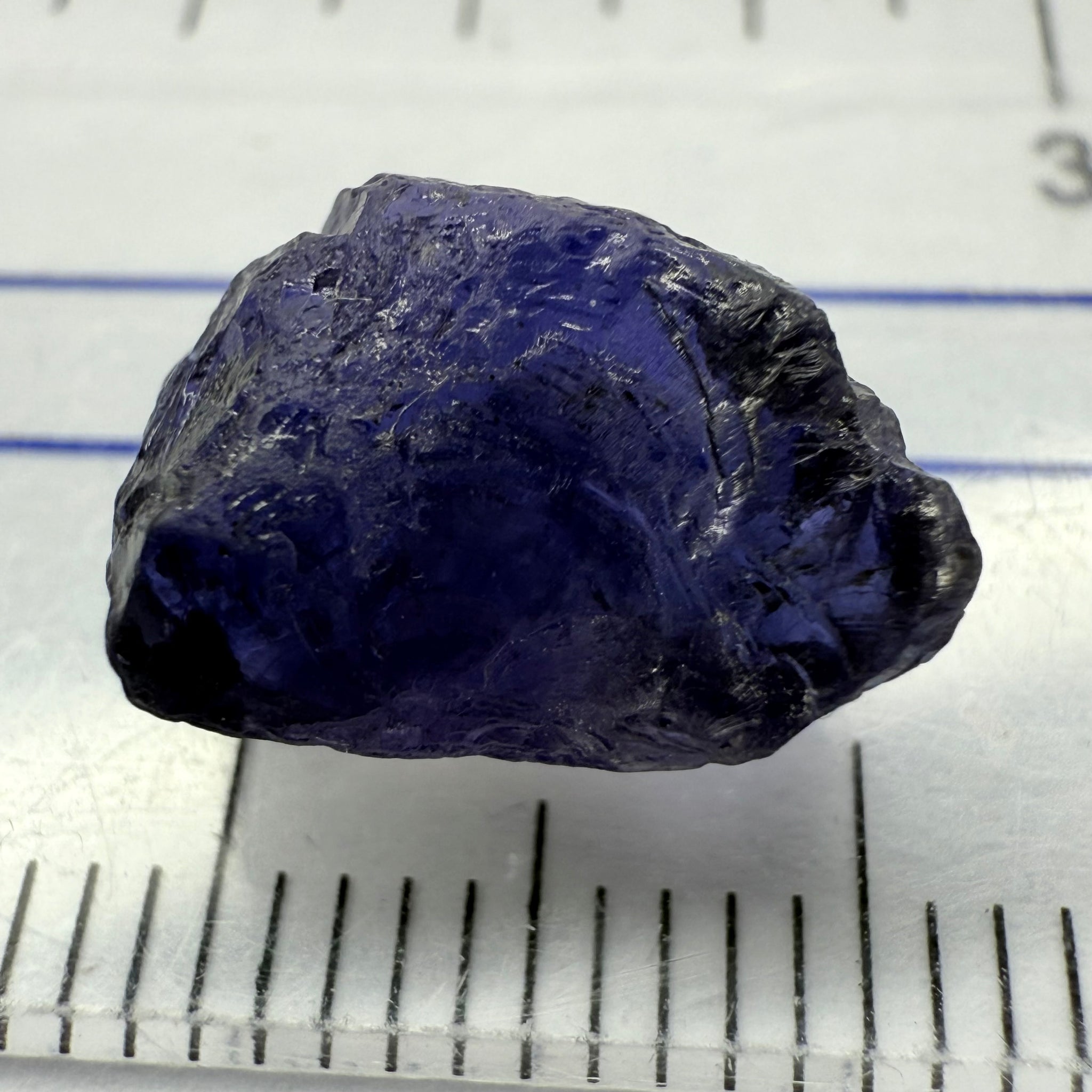 Iolite, 4.84ct, Tanzania, Untreated Unheated, slight inclusions and some white spots, has a flattish shape