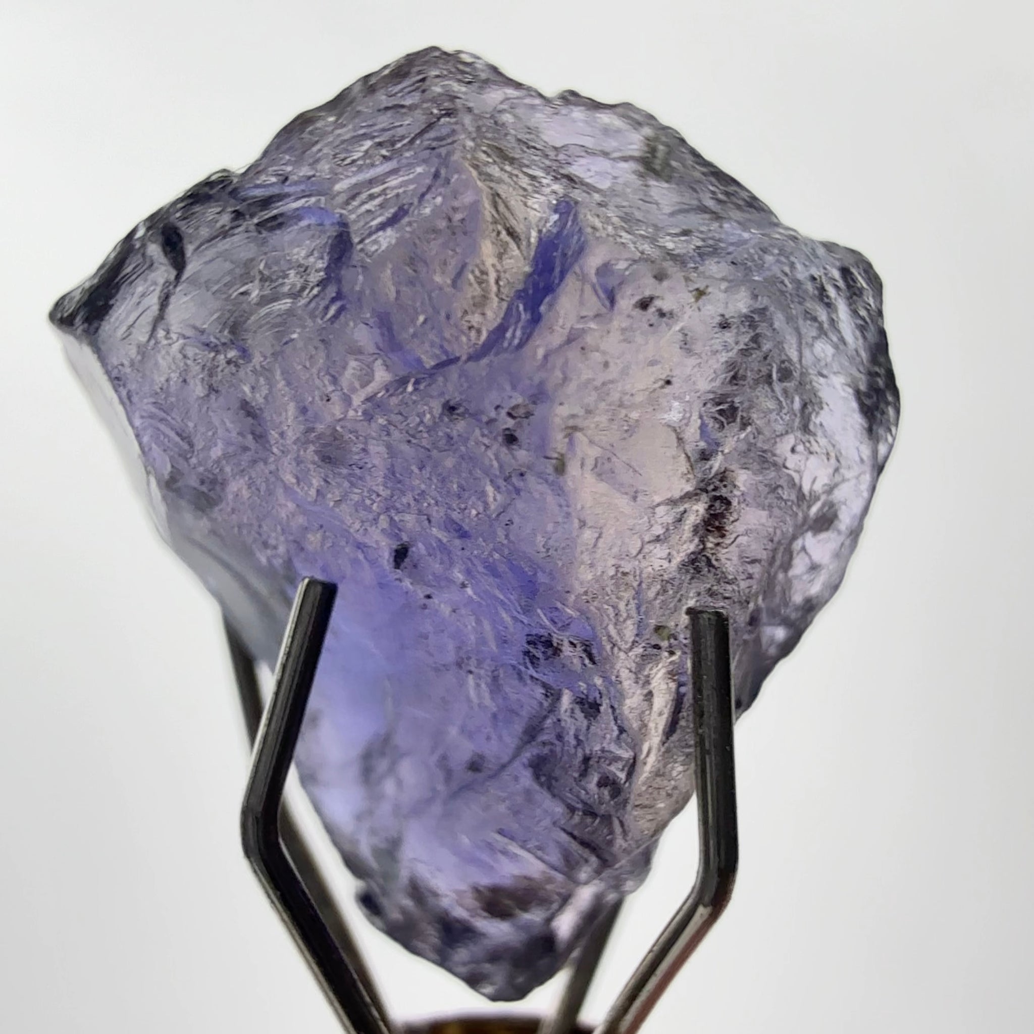 Iolite, 4.84ct, Tanzania, Untreated Unheated, slight inclusions and some white spots, has a flattish shape