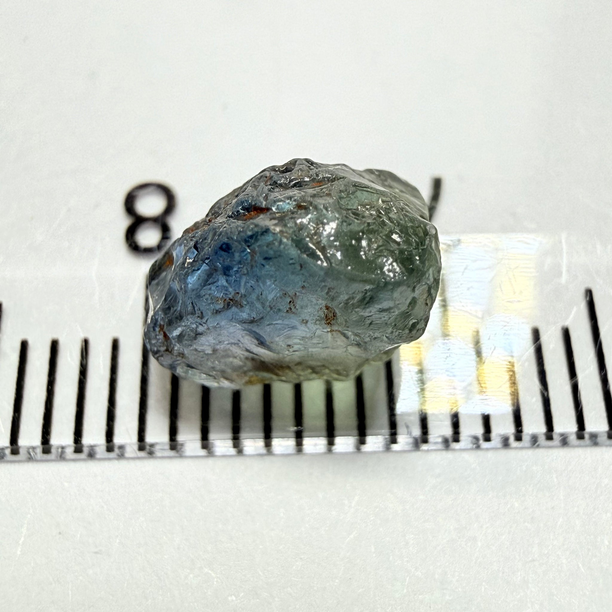 Umba Sapphire, 3.84ct, Umba Valley, Tanzania, Untreated Unheated. Moderately included with a crack coming in 2mm on the side rest has white crystal inclusions and silk