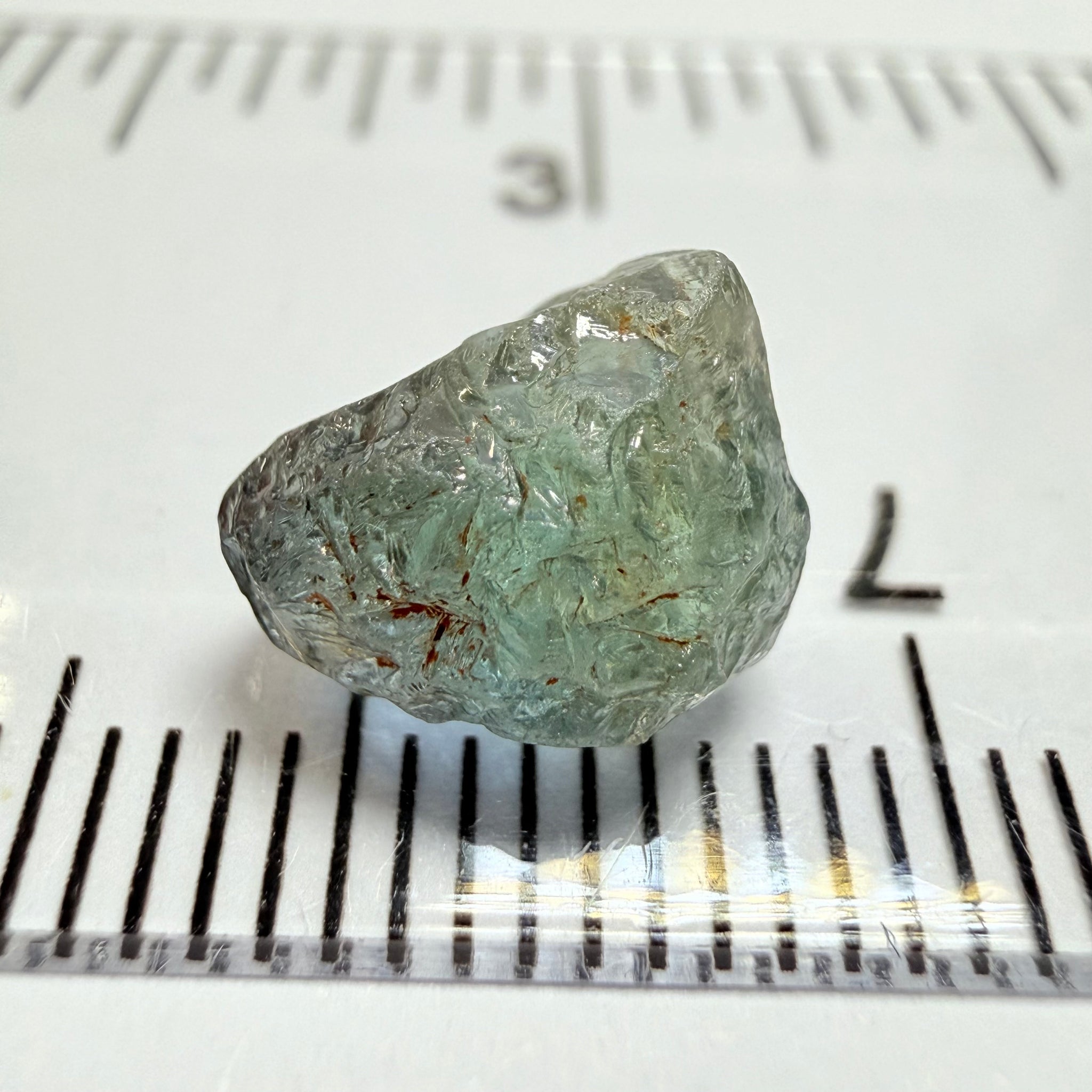 Umba Sapphire, 3.84ct, Umba Valley, Tanzania, Untreated Unheated. Moderately included with a crack coming in 2mm on the side rest has white crystal inclusions and silk
