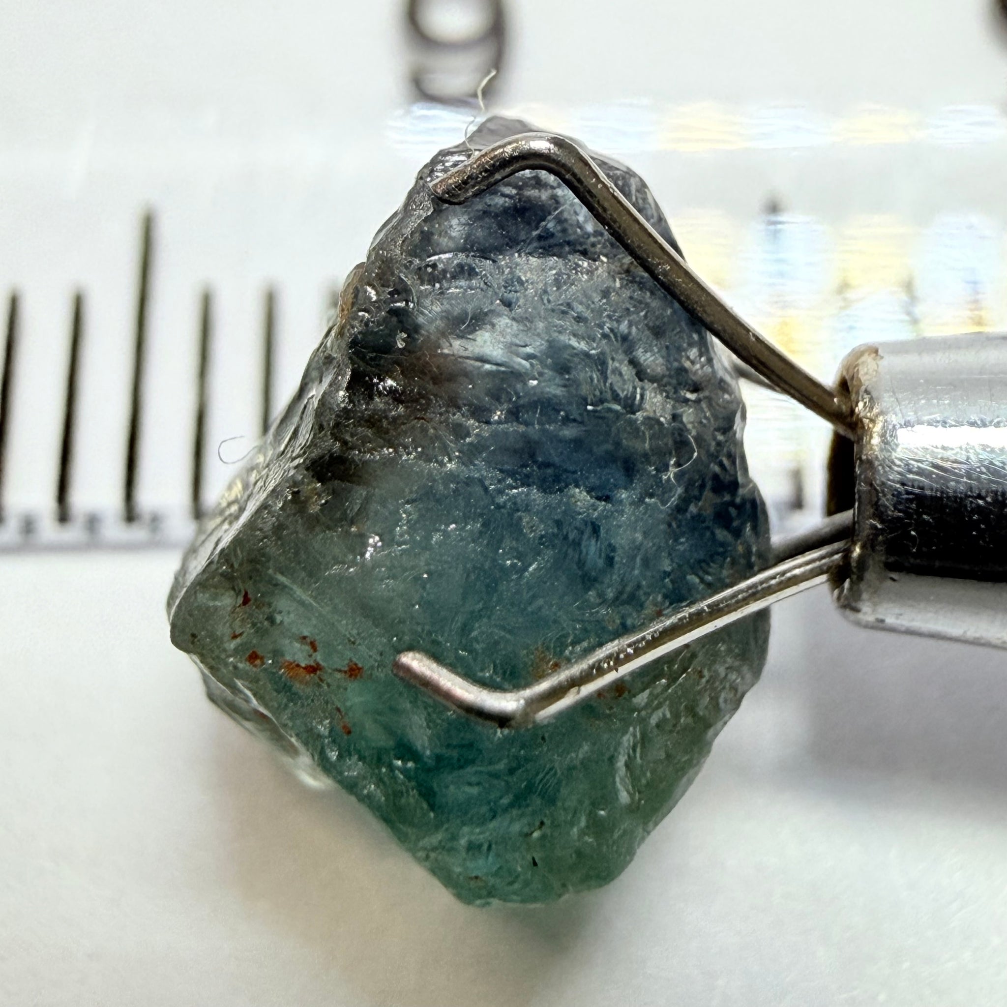 Umba Sapphire, 3.84ct, Umba Valley, Tanzania, Untreated Unheated. Moderately included with a crack coming in 2mm on the side rest has white crystal inclusions and silk