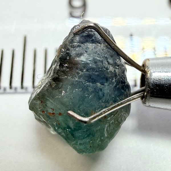 Umba Sapphire, 3.84ct, Umba Valley, Tanzania, Untreated Unheated. Moderately included with a crack coming in 2mm on the side rest has white crystal inclusions and silk