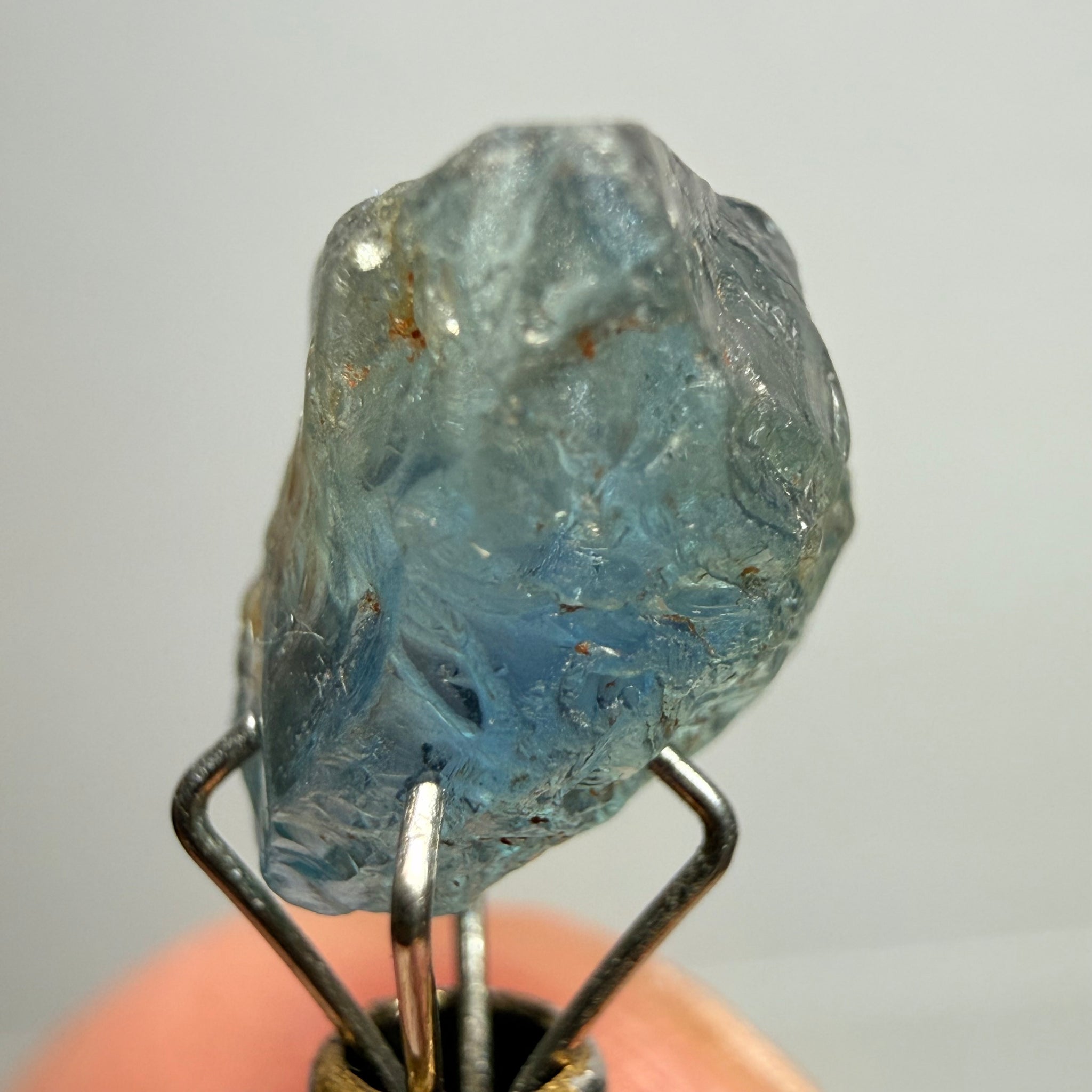 Umba Sapphire, 3.84ct, Umba Valley, Tanzania, Untreated Unheated. Moderately included with a crack coming in 2mm on the side rest has white crystal inclusions and silk