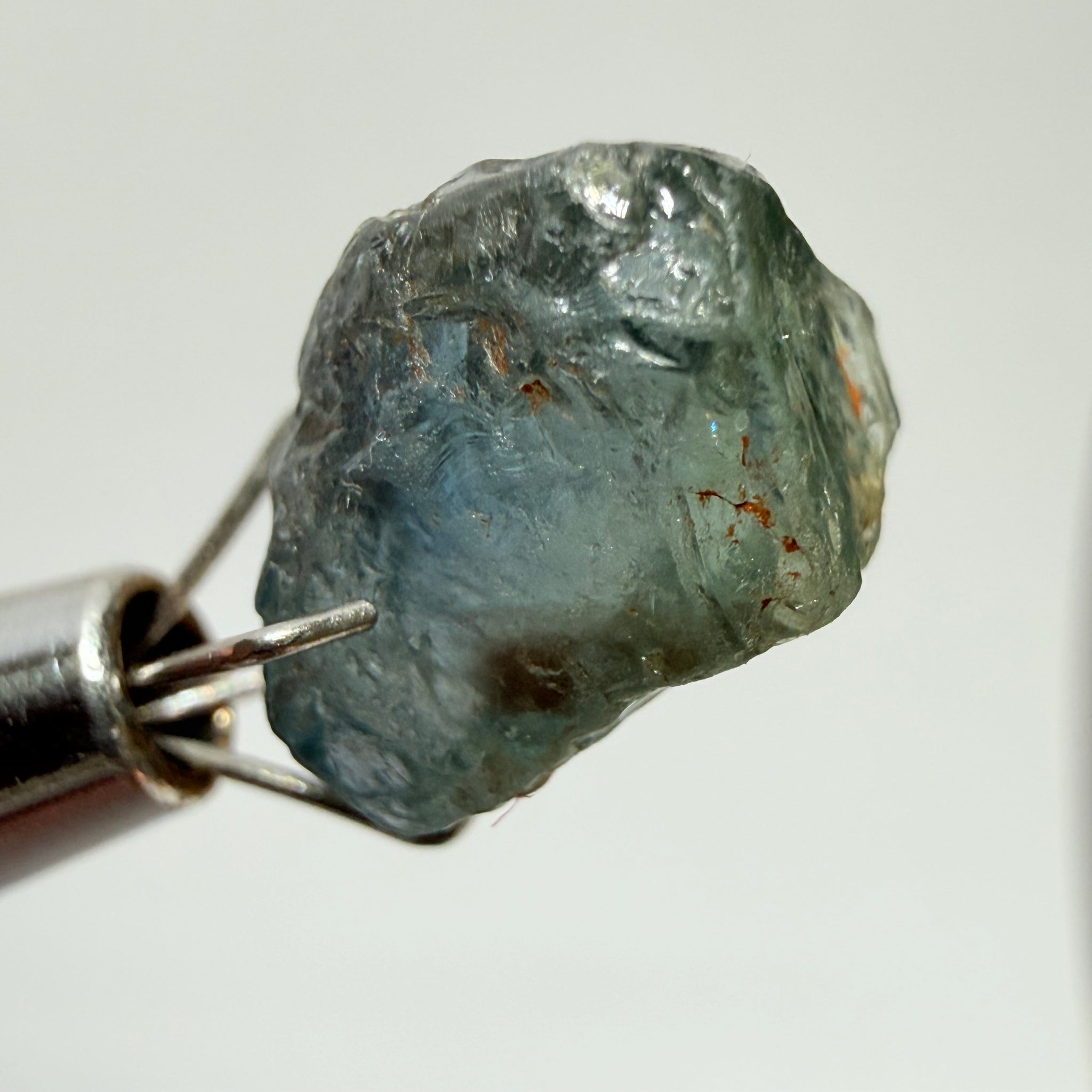 Umba Sapphire, 3.84ct, Umba Valley, Tanzania, Untreated Unheated. Moderately included with a crack coming in 2mm on the side rest has white crystal inclusions and silk