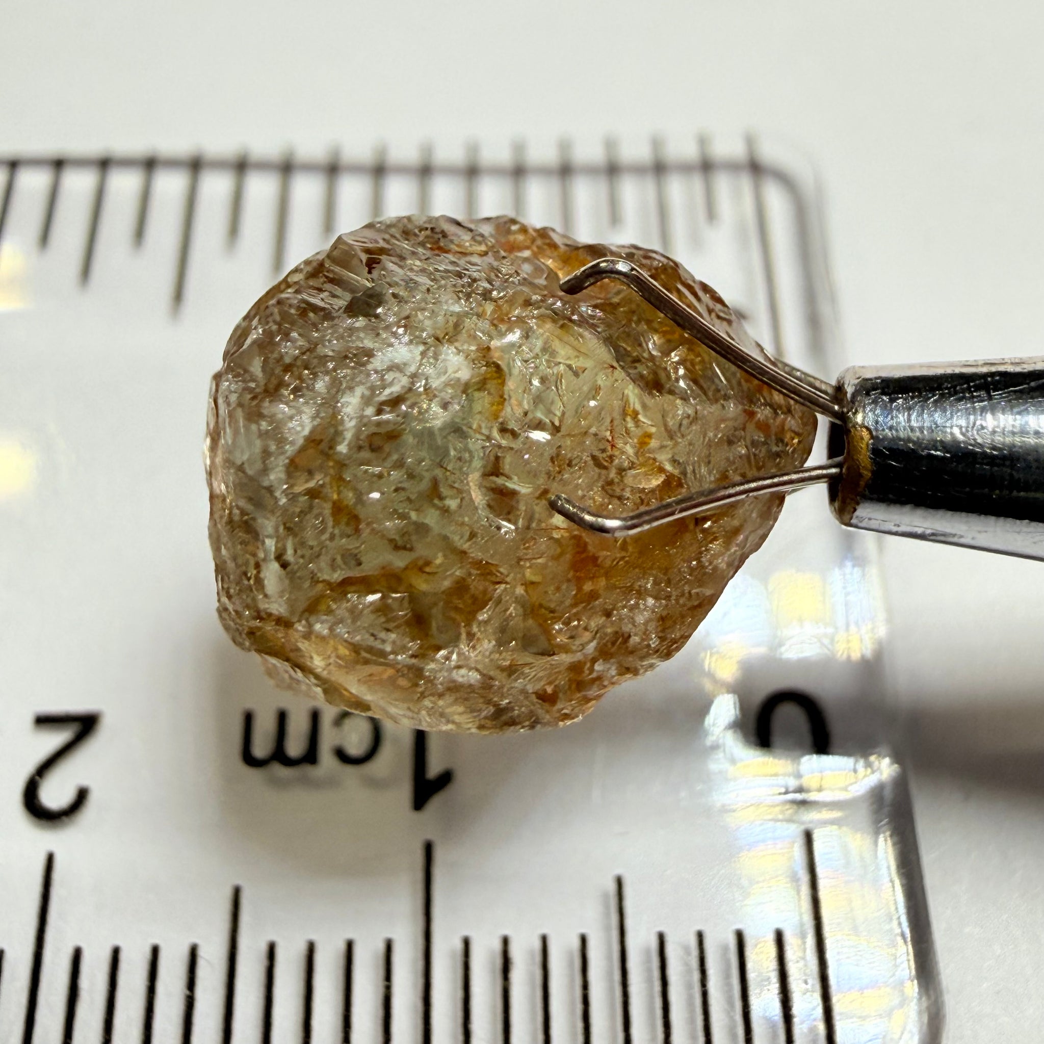 Umba Sapphire, 14.22ct, Umba Valley, Tanzania, Untreated Unheated. Very slight inclusion on the outside skin that will need to be removed before faceting, rest are needles, see videos backlit
