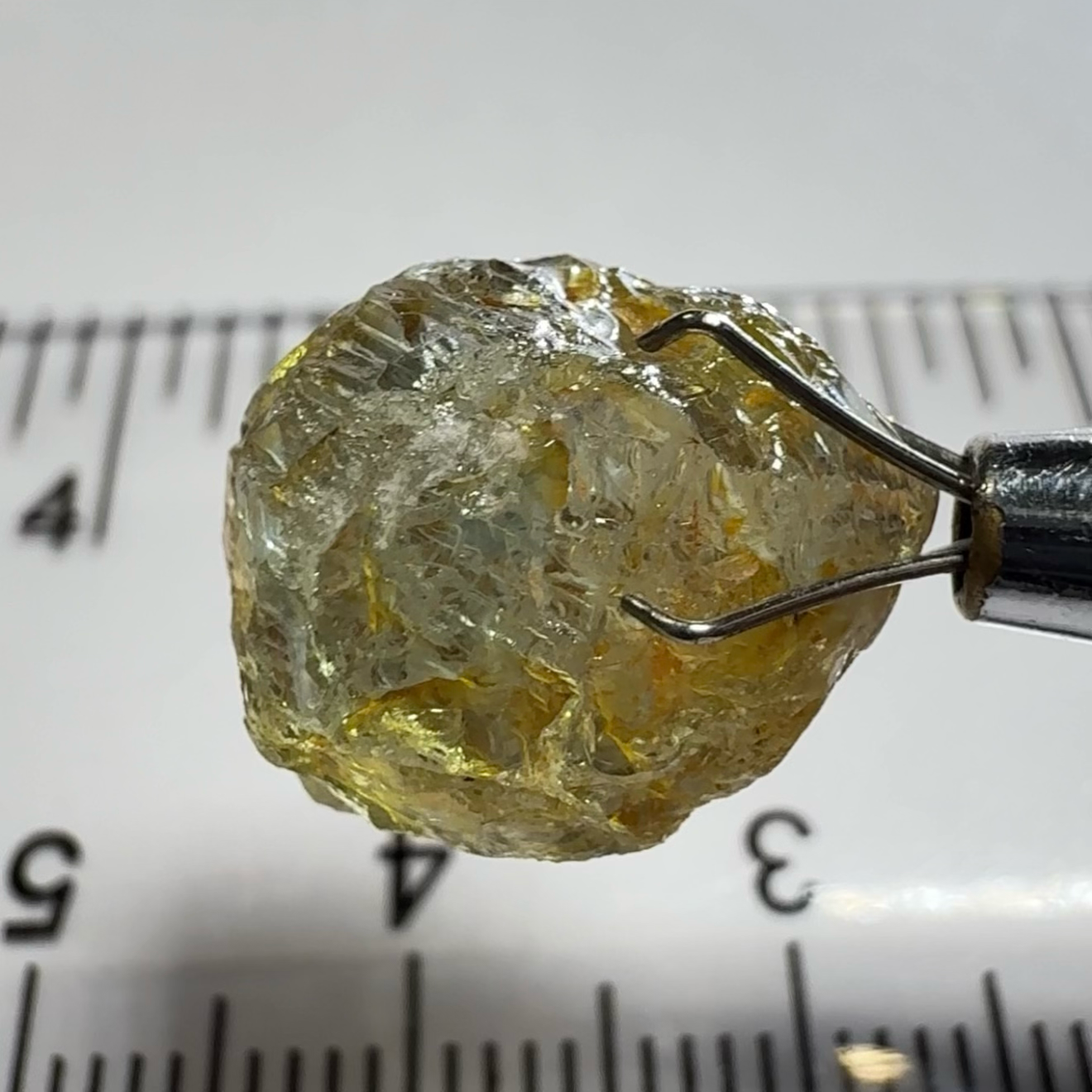 Umba Sapphire, 14.22ct, Umba Valley, Tanzania, Untreated Unheated. Very slight inclusion on the outside skin that will need to be removed before faceting, rest are needles, see videos backlit