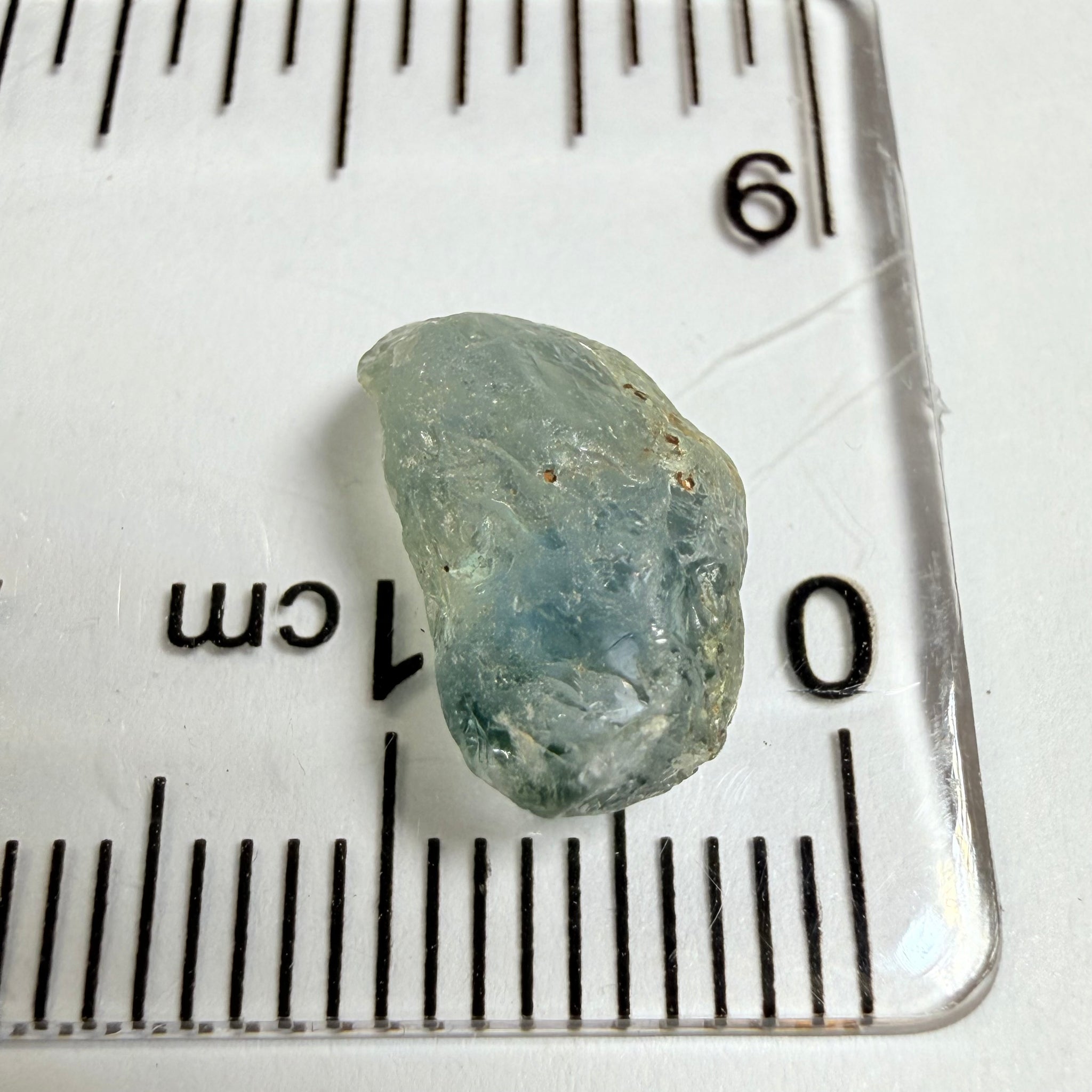 Umba Sapphire, 4.16ct, Umba Valley, Tanzania, Untreated Unheated. Small, white crystal inclusions through the stone, flat shape