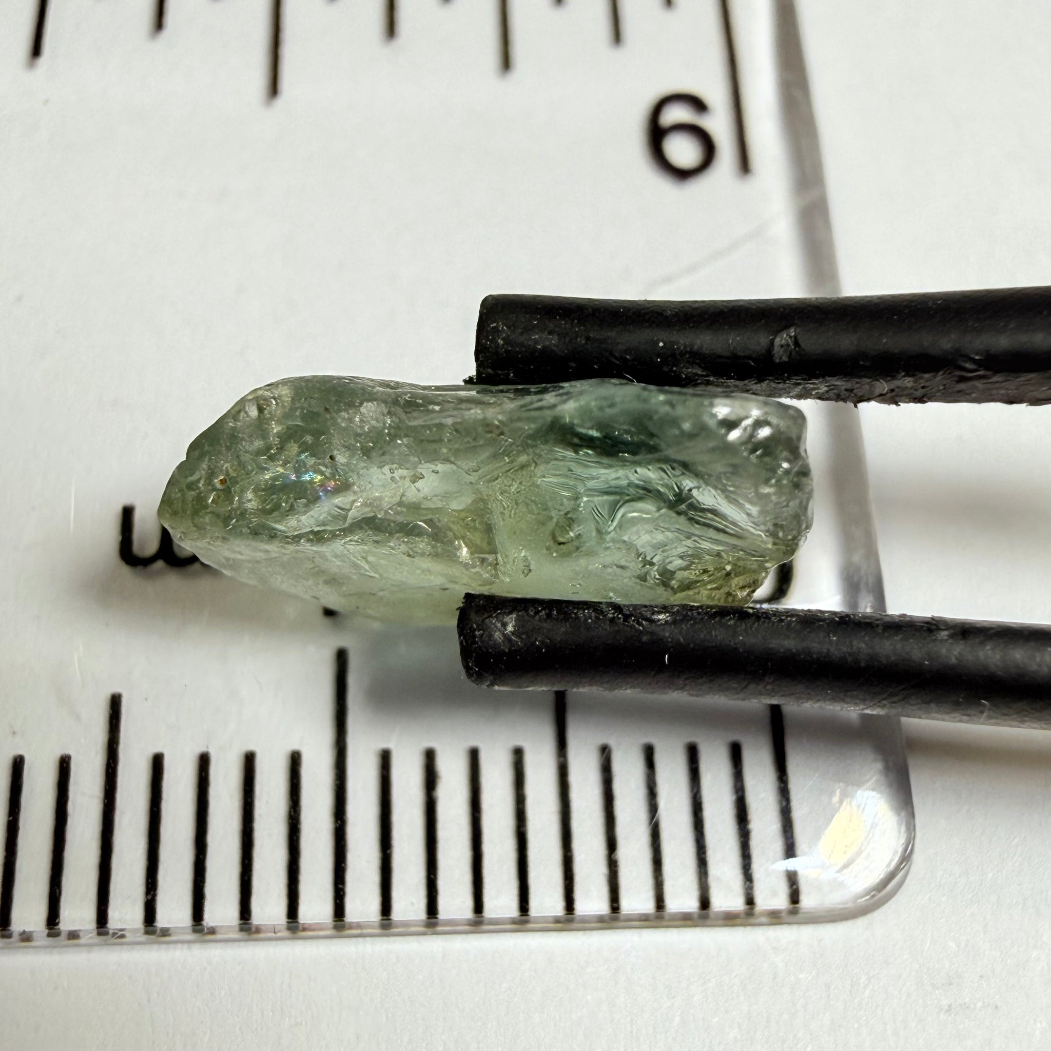 Umba Sapphire, 4.16ct, Umba Valley, Tanzania, Untreated Unheated. Small, white crystal inclusions through the stone, flat shape