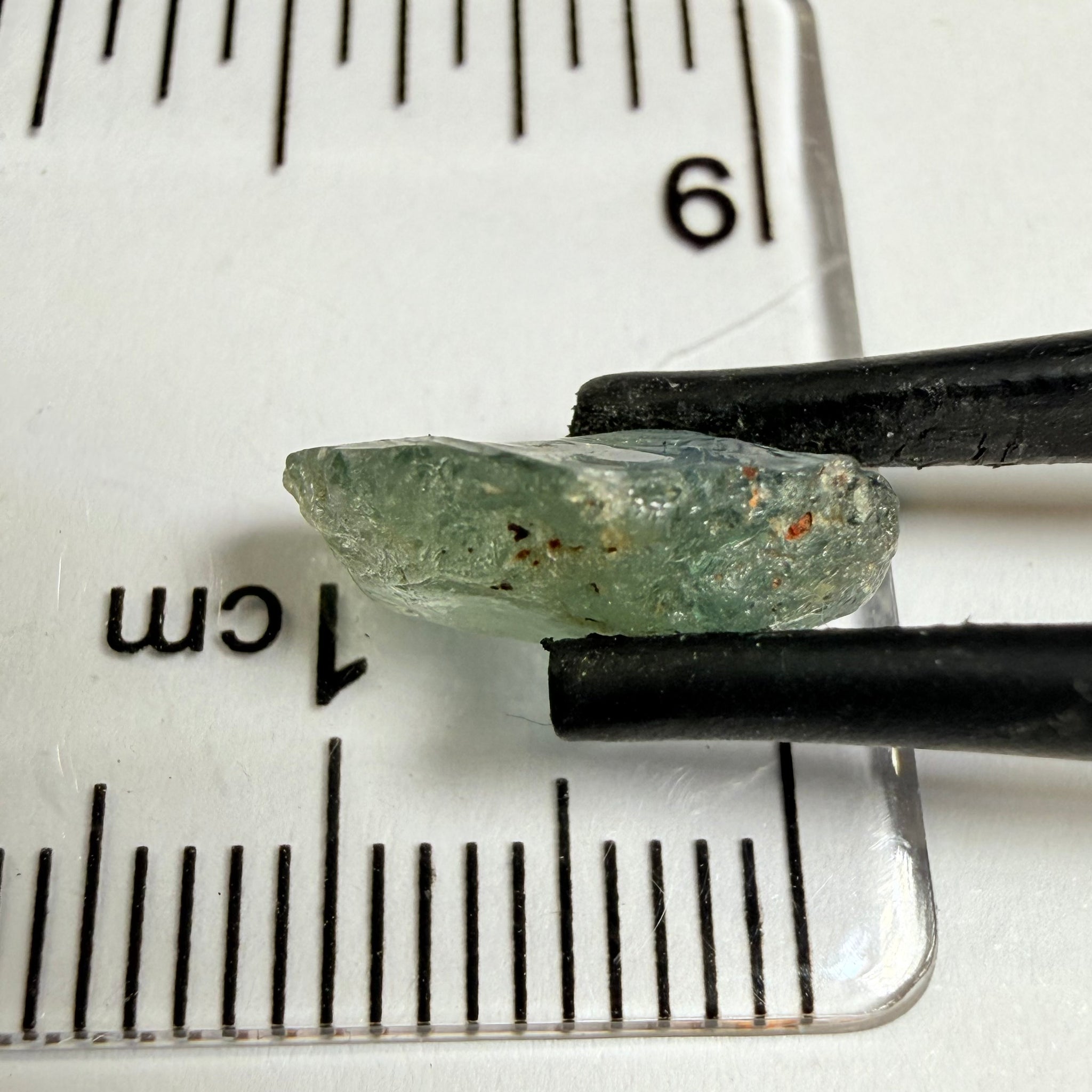 Umba Sapphire, 4.16ct, Umba Valley, Tanzania, Untreated Unheated. Small, white crystal inclusions through the stone, flat shape