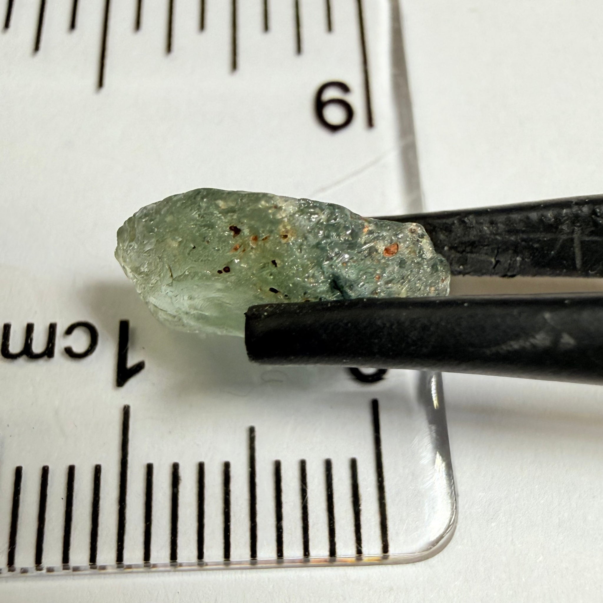 Umba Sapphire, 4.16ct, Umba Valley, Tanzania, Untreated Unheated. Small, white crystal inclusions through the stone, flat shape