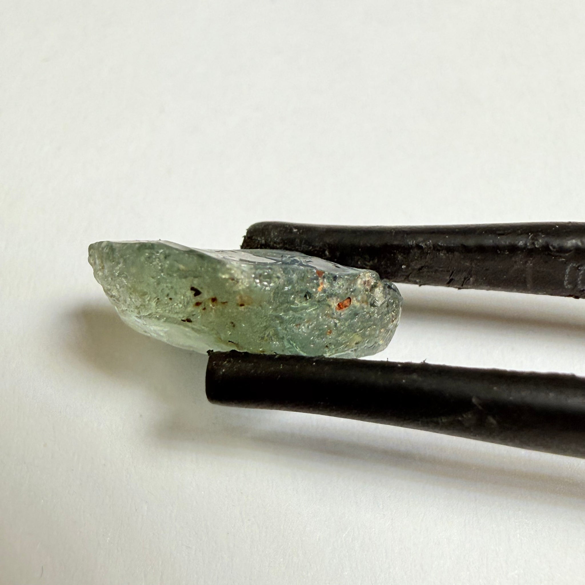 Umba Sapphire, 4.16ct, Umba Valley, Tanzania, Untreated Unheated. Small, white crystal inclusions through the stone, flat shape