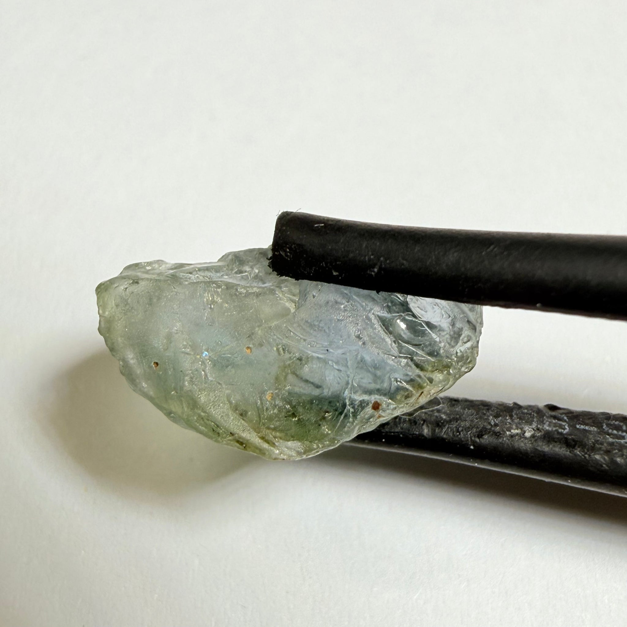 Umba Sapphire, 4.16ct, Umba Valley, Tanzania, Untreated Unheated. Small, white crystal inclusions through the stone, flat shape