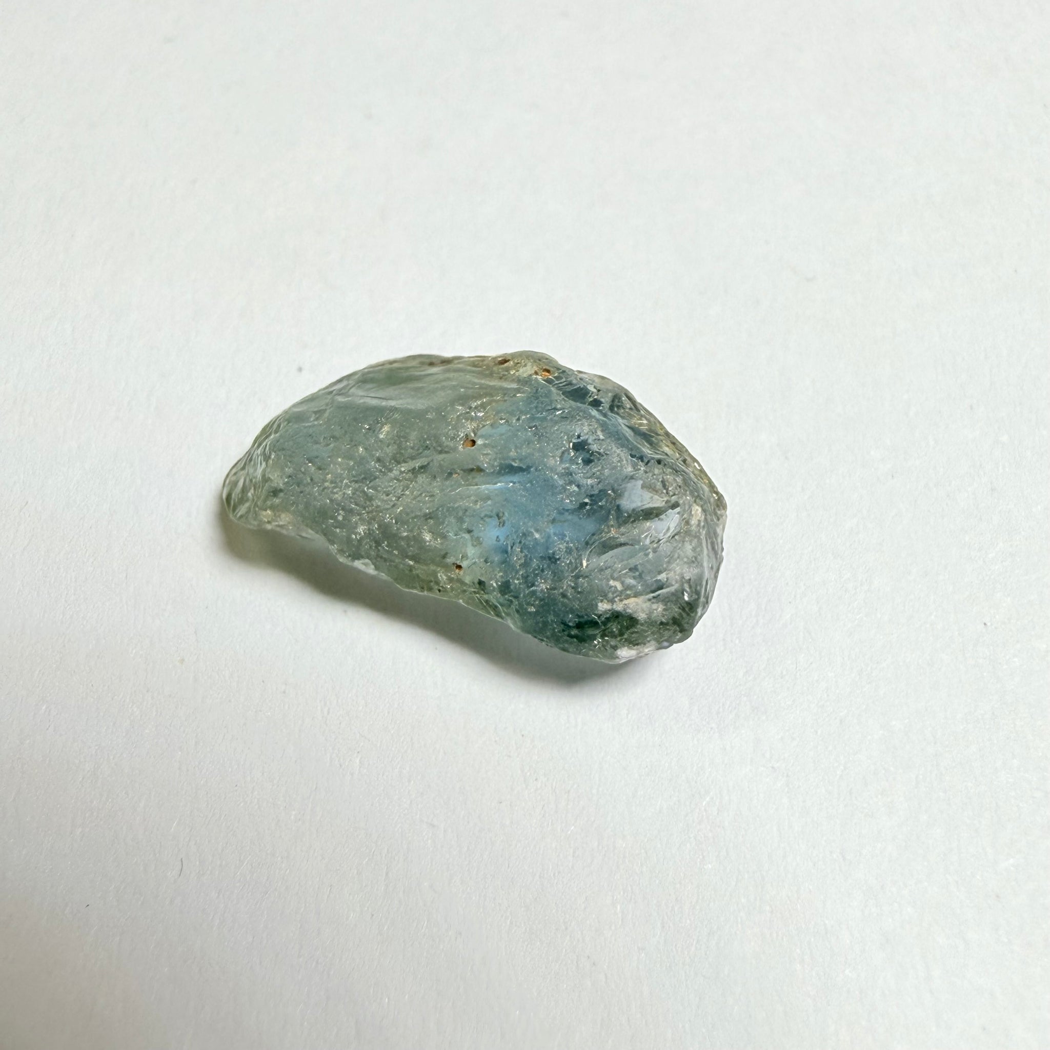Umba Sapphire, 4.16ct, Umba Valley, Tanzania, Untreated Unheated. Small, white crystal inclusions through the stone, flat shape