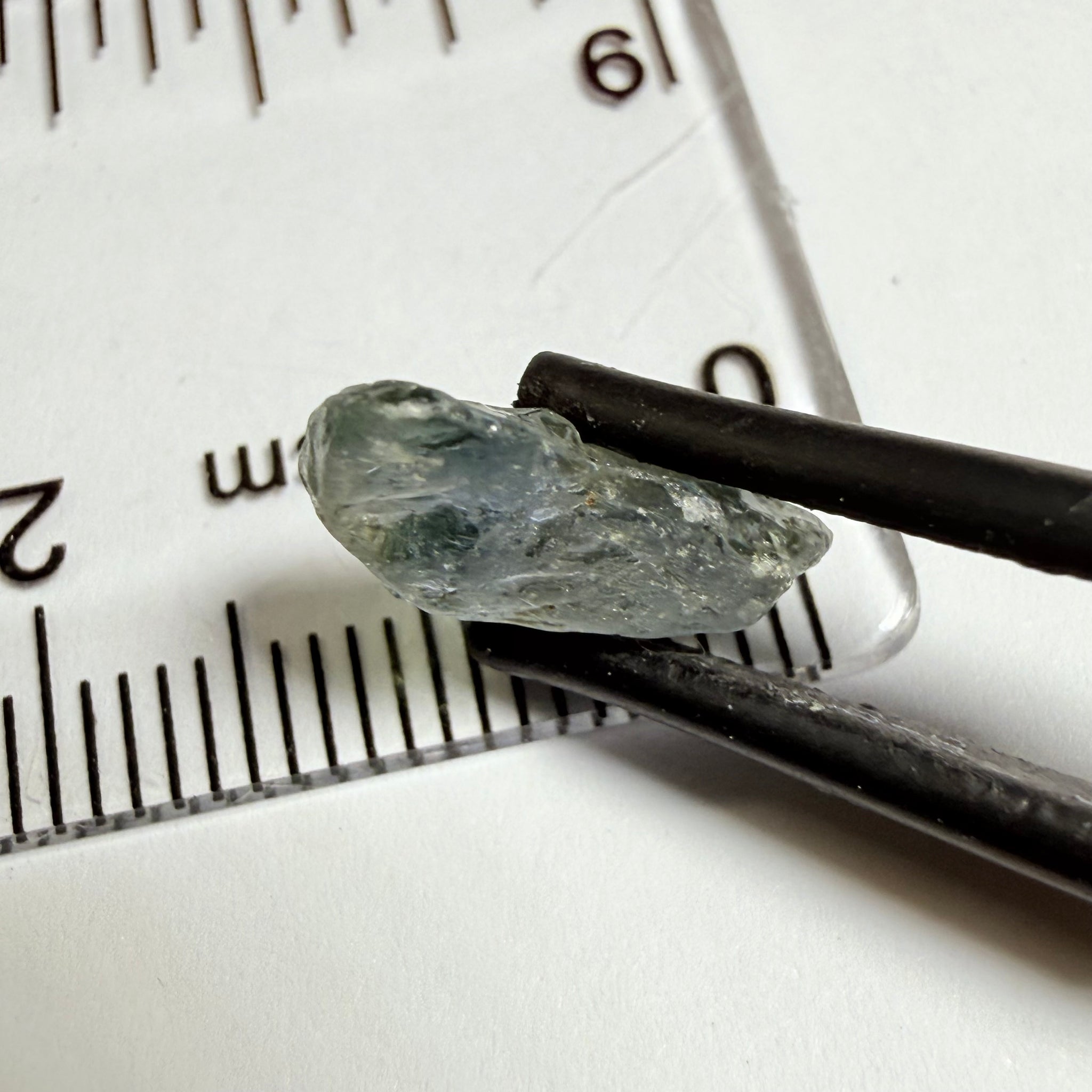 Umba Sapphire, 4.16ct, Umba Valley, Tanzania, Untreated Unheated. Small, white crystal inclusions through the stone, flat shape