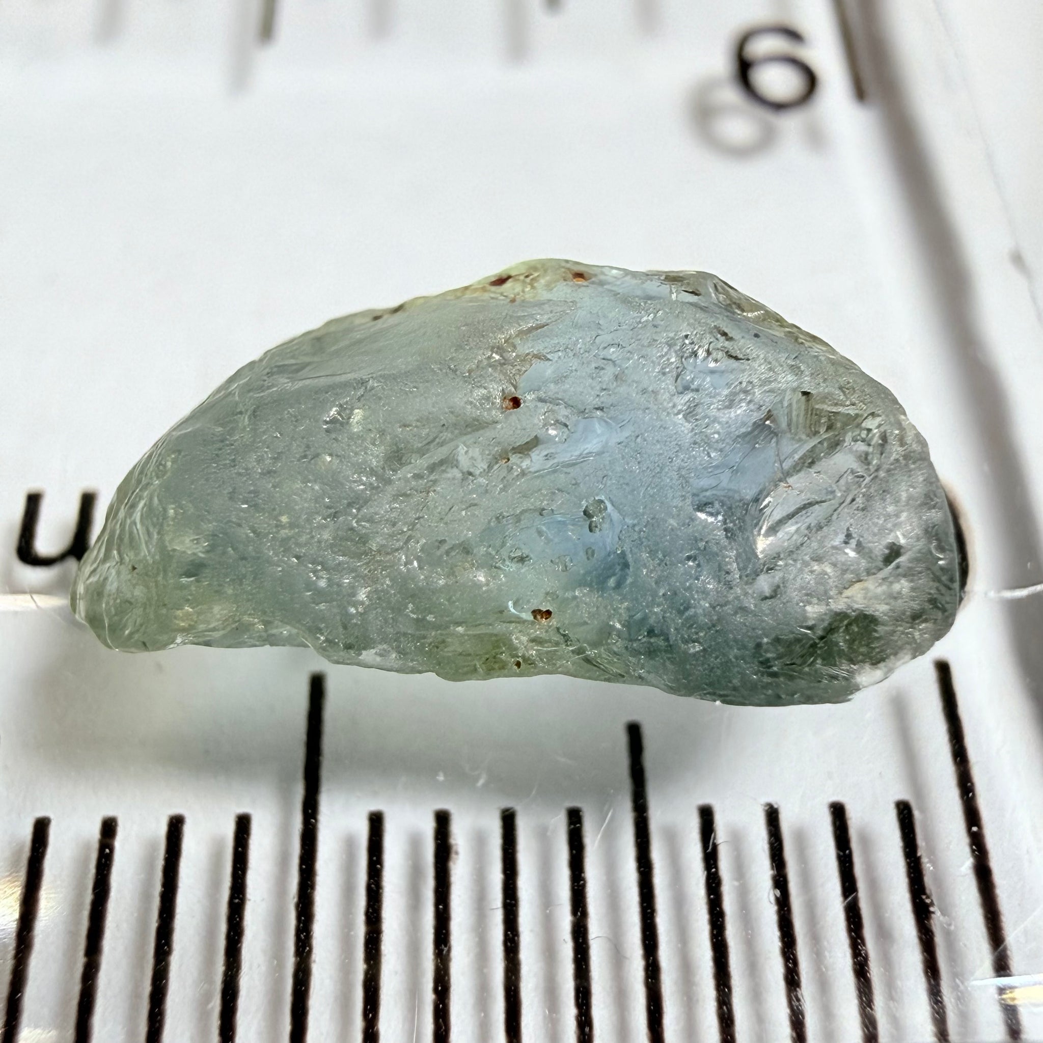 Umba Sapphire, 4.16ct, Umba Valley, Tanzania, Untreated Unheated. Small, white crystal inclusions through the stone, flat shape