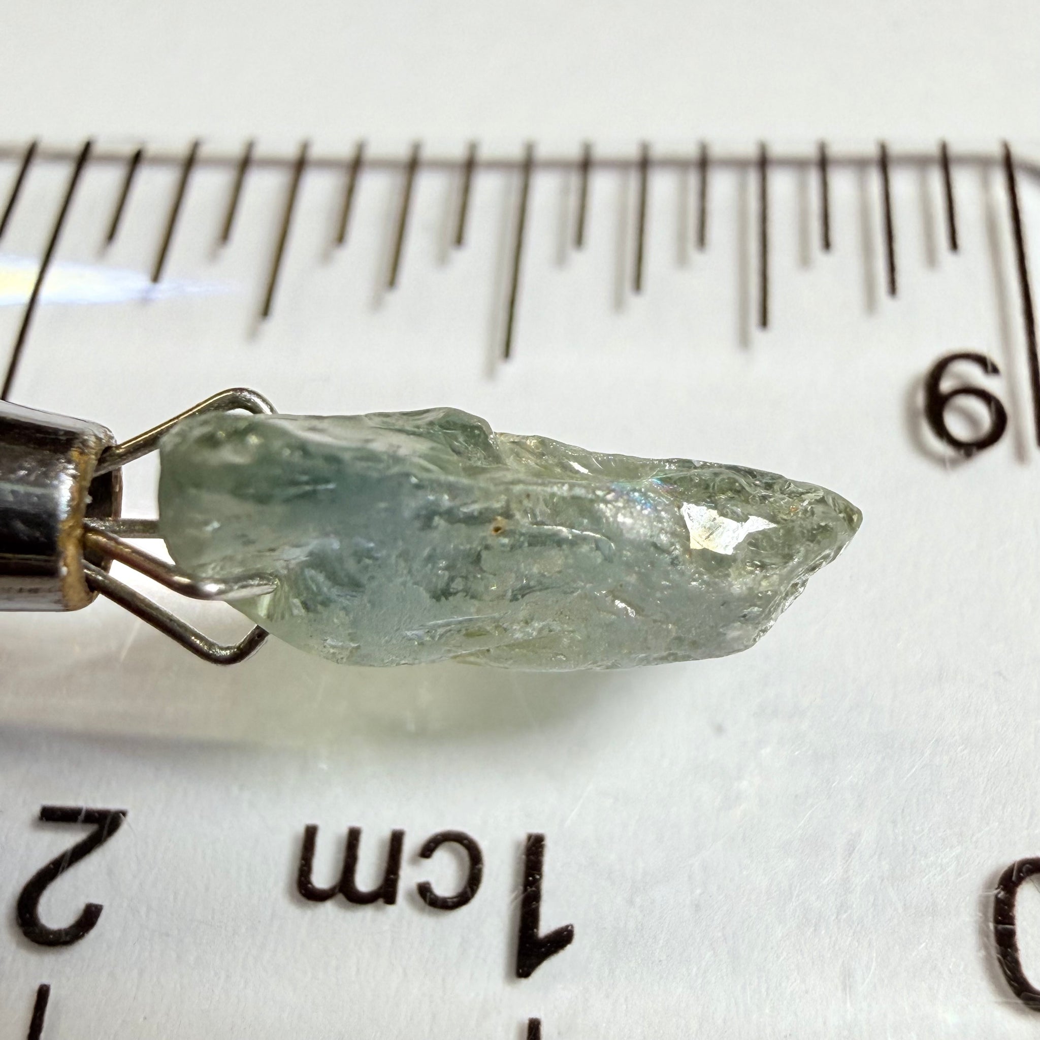 Umba Sapphire, 4.16ct, Umba Valley, Tanzania, Untreated Unheated. Small, white crystal inclusions through the stone, flat shape