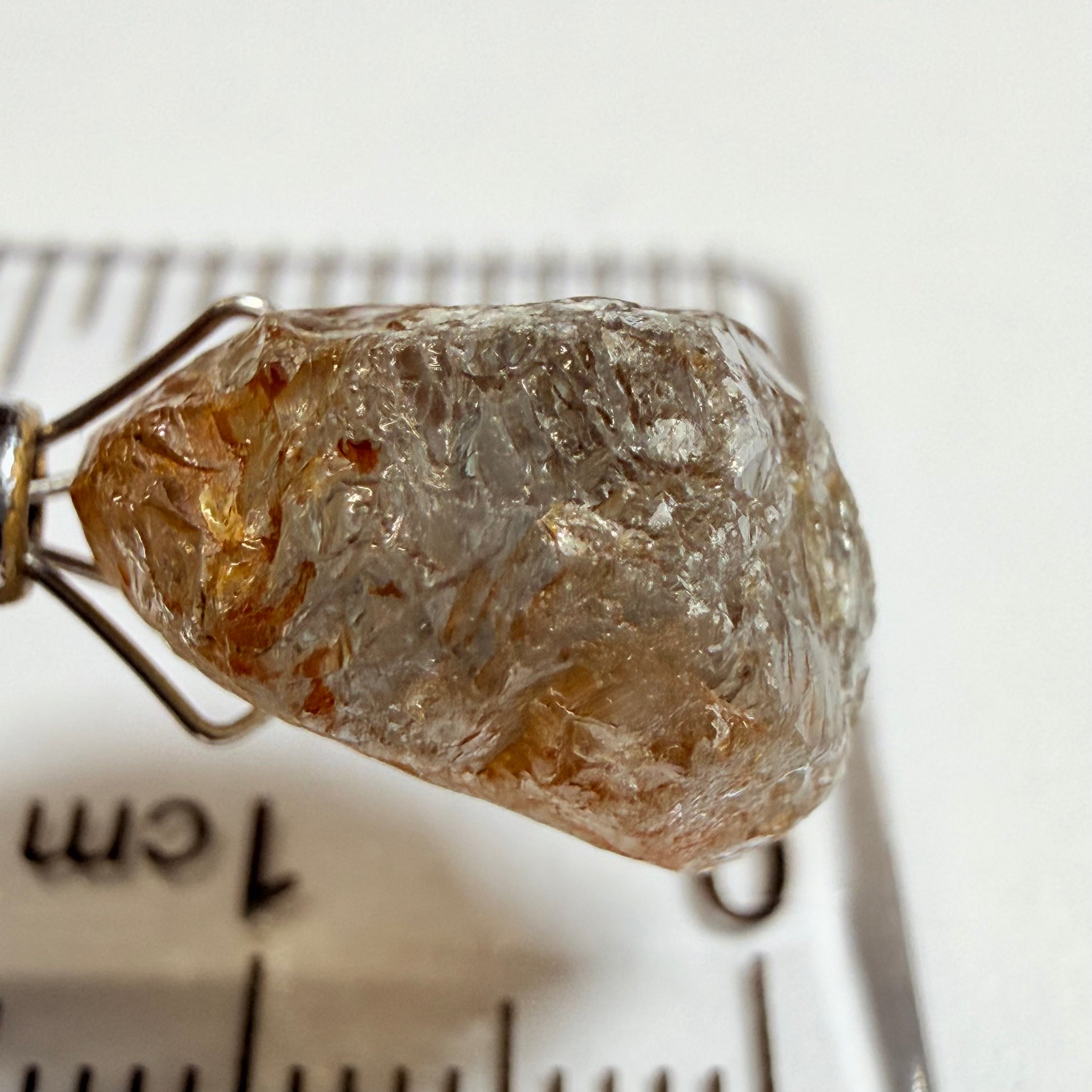 Umba Sapphire, 14.22ct, Umba Valley, Tanzania, Untreated Unheated. Very slight inclusion on the outside skin that will need to be removed before faceting, rest are needles, see videos backlit