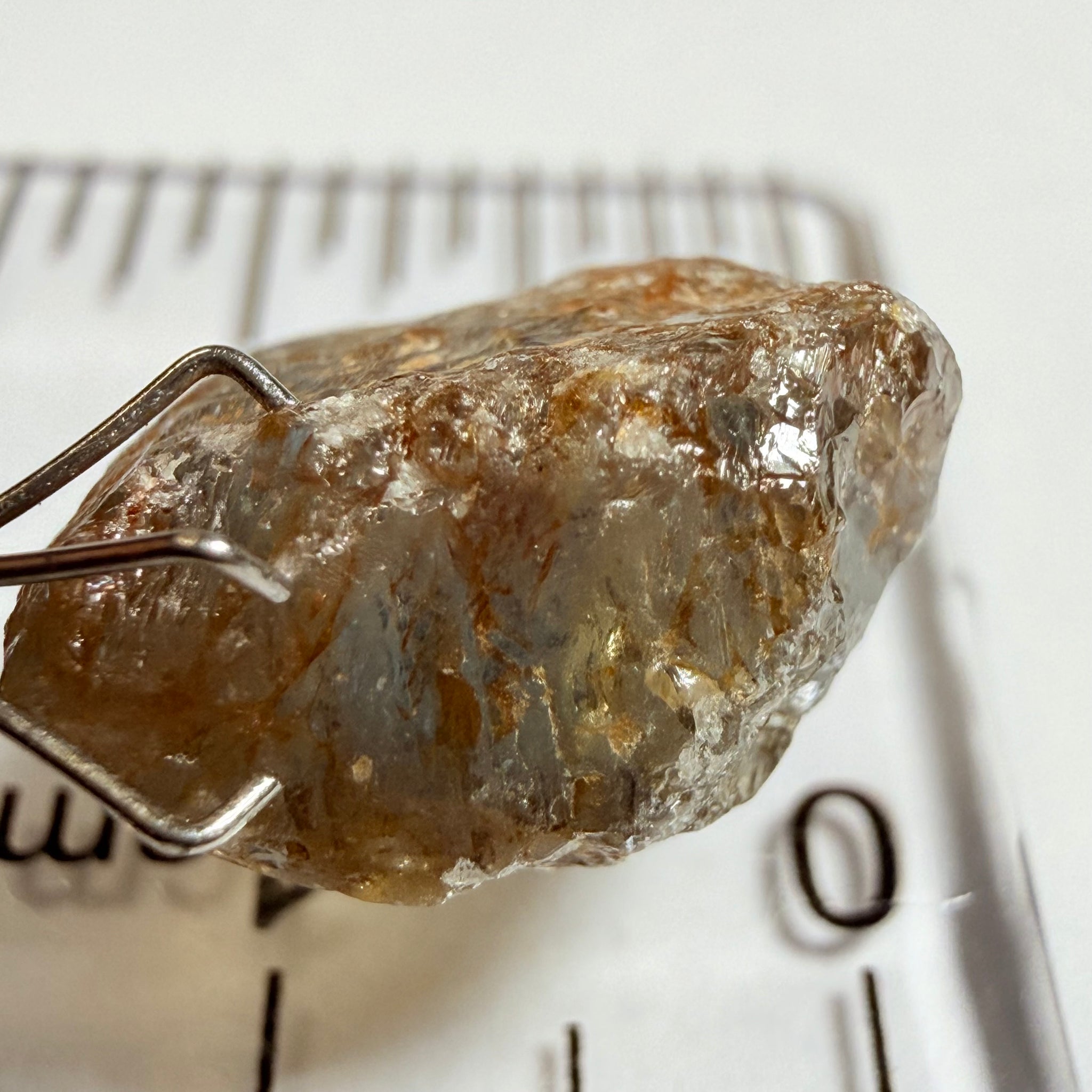 Umba Sapphire, 14.22ct, Umba Valley, Tanzania, Untreated Unheated. Very slight inclusion on the outside skin that will need to be removed before faceting, rest are needles, see videos backlit