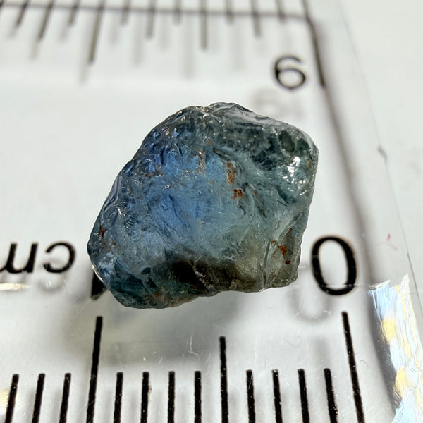 Umba Sapphire, 3.84ct, Umba Valley, Tanzania, Untreated Unheated. Moderately included with a crack coming in 2mm on the side rest has white crystal inclusions and silk