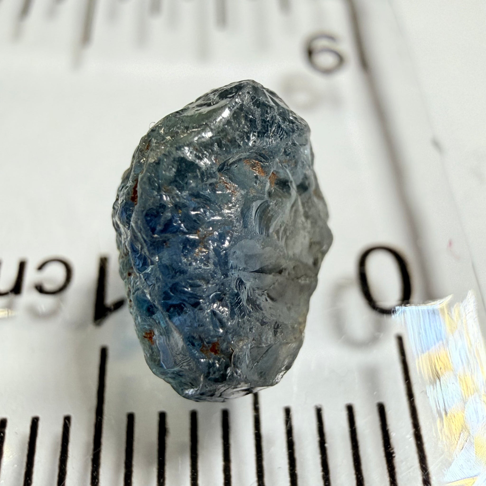 Umba Sapphire, 3.84ct, Umba Valley, Tanzania, Untreated Unheated. Moderately included with a crack coming in 2mm on the side rest has white crystal inclusions and silk