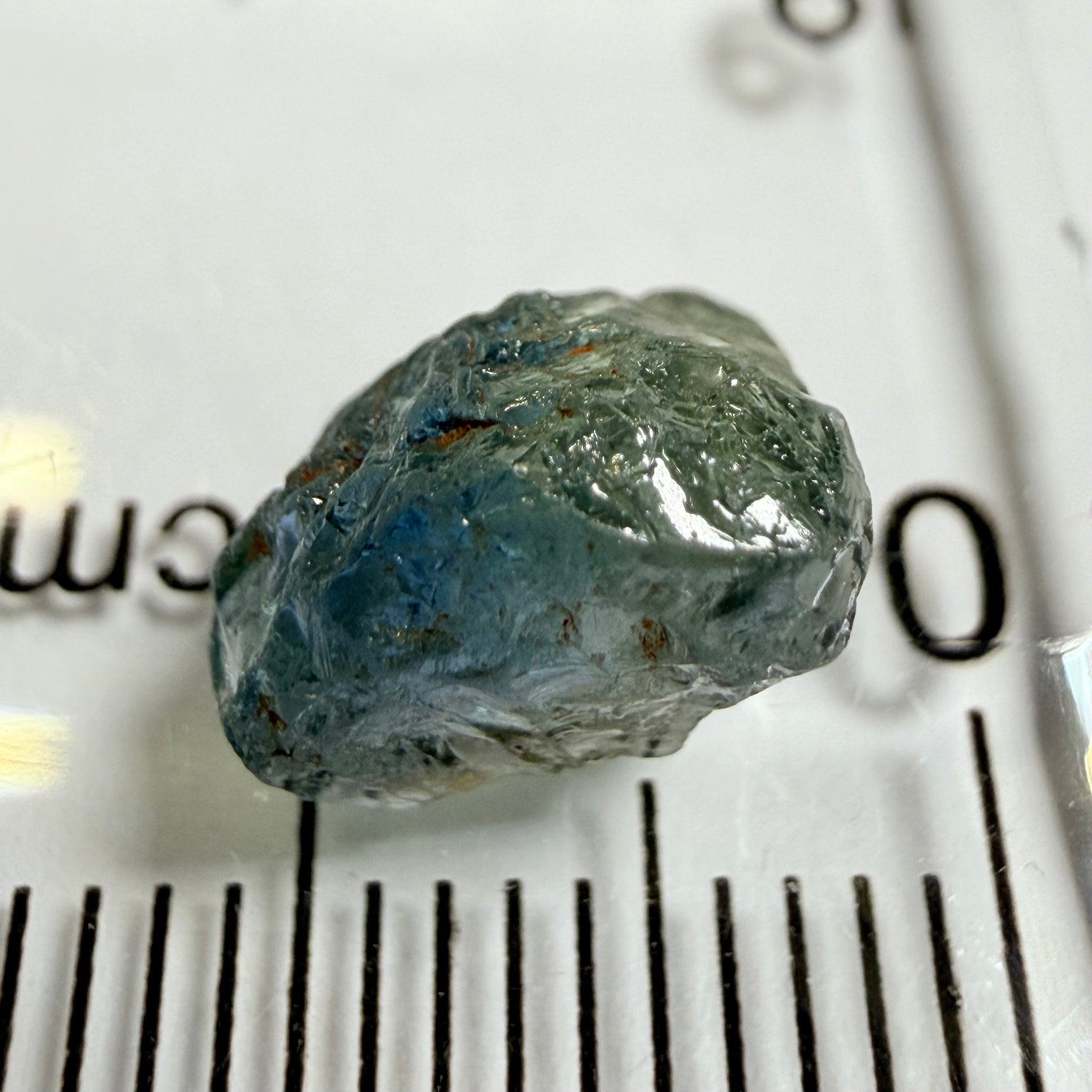 Umba Sapphire, 3.84ct, Umba Valley, Tanzania, Untreated Unheated. Moderately included with a crack coming in 2mm on the side rest has white crystal inclusions and silk