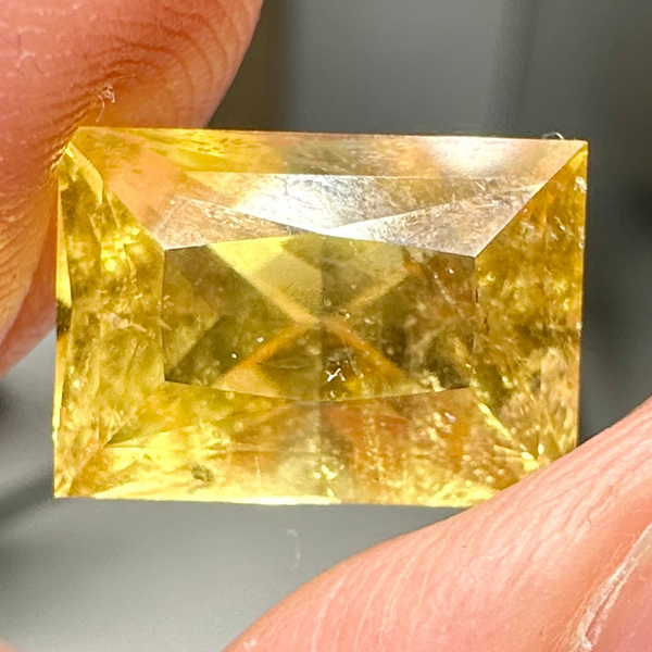 Vivid Intense Yellow Golden Danburite, 8.035ct, Tanzania, Untreated Unheated. Slightly included. Super rare. High brilliance and vivid. Precision Cut. 12.8 x 9 x 8.8mm