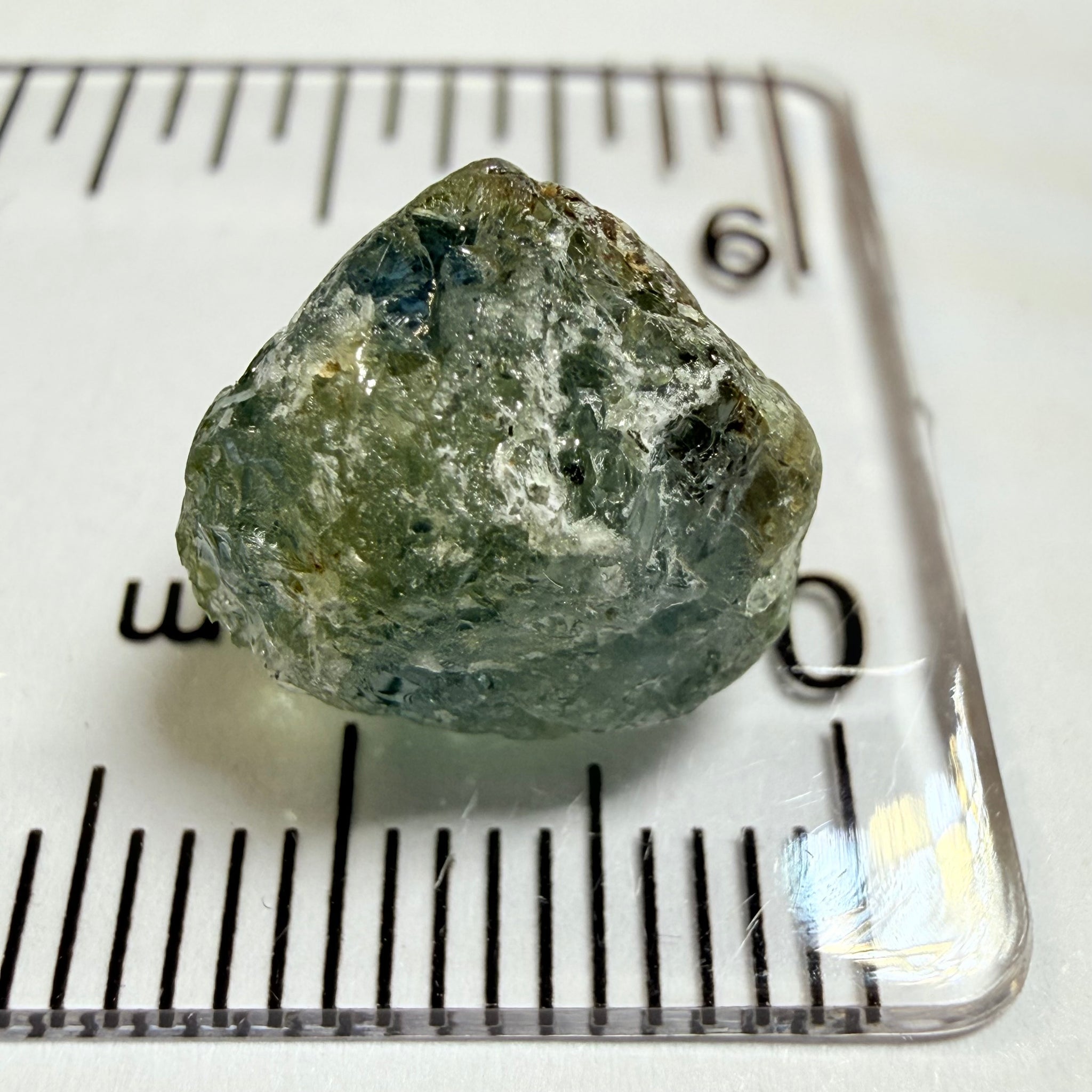 Umba Sapphire, 9.88ct, Umba Valley, Tanzania, Untreated Unheated. Slightly to moderately included which some surface gunk to be removed on preform. See the backlit pics