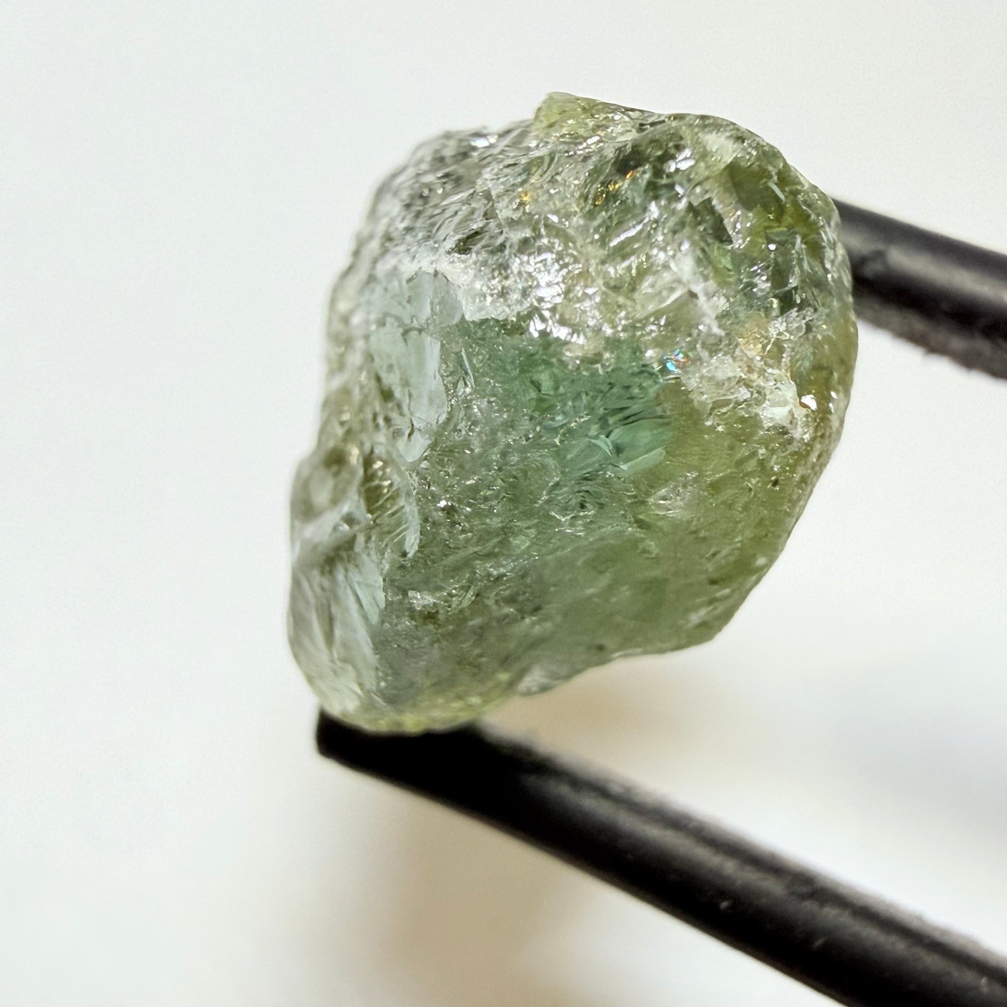Umba Sapphire, 9.88ct, Umba Valley, Tanzania, Untreated Unheated. Slightly to moderately included which some surface gunk to be removed on preform. See the backlit pics