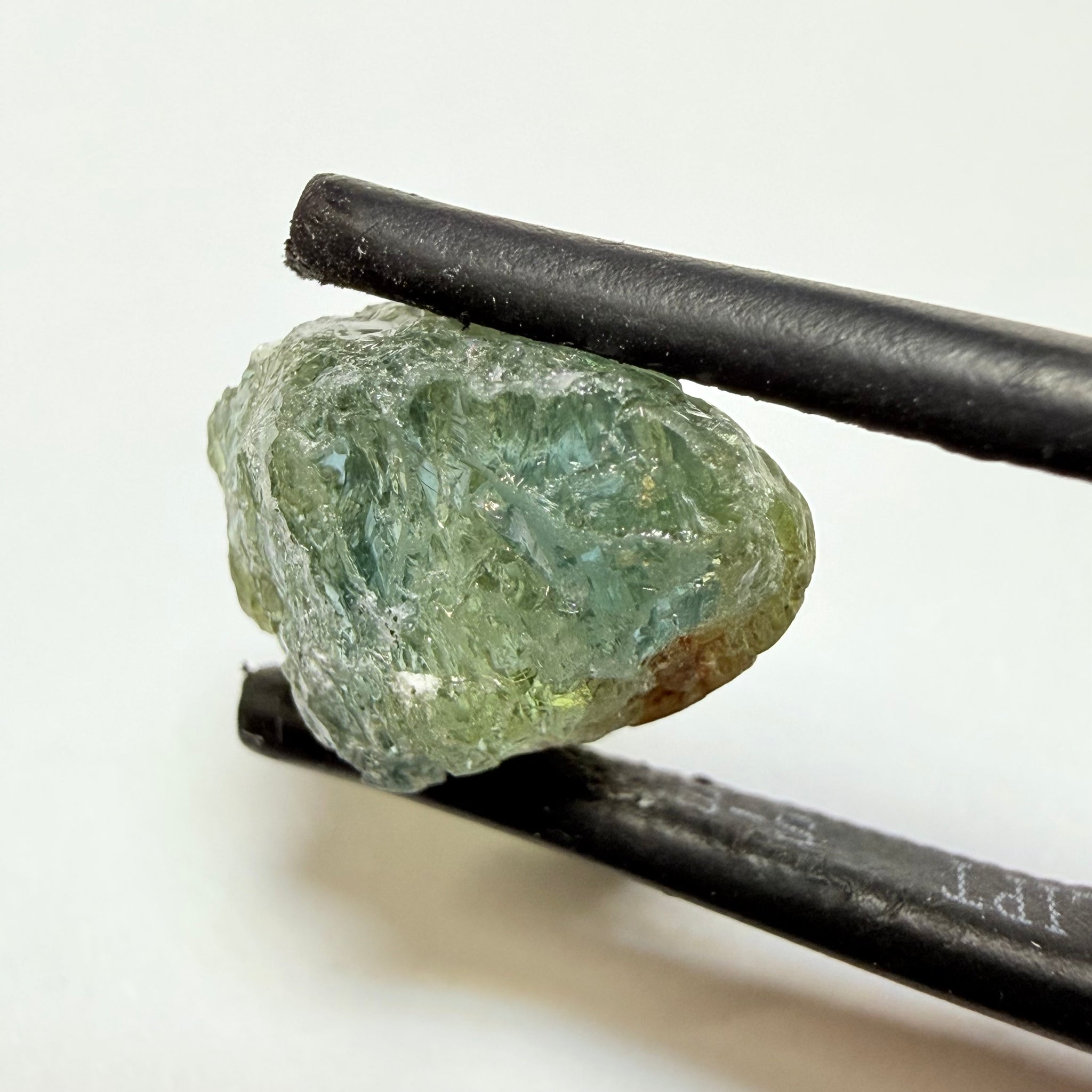 Umba Sapphire, 9.88ct, Umba Valley, Tanzania, Untreated Unheated. Slightly to moderately included which some surface gunk to be removed on preform. See the backlit pics