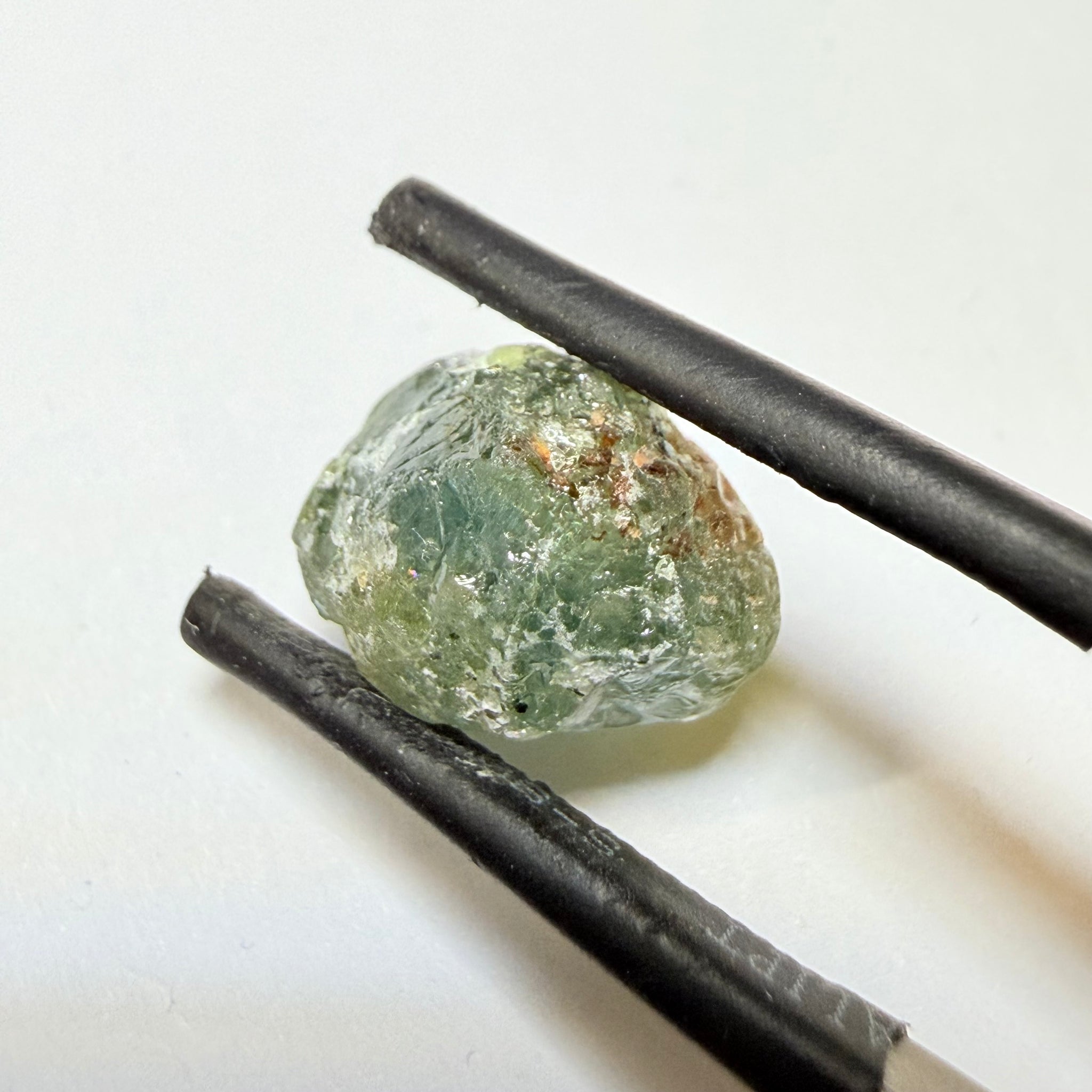 Umba Sapphire, 9.88ct, Umba Valley, Tanzania, Untreated Unheated. Slightly to moderately included which some surface gunk to be removed on preform. See the backlit pics
